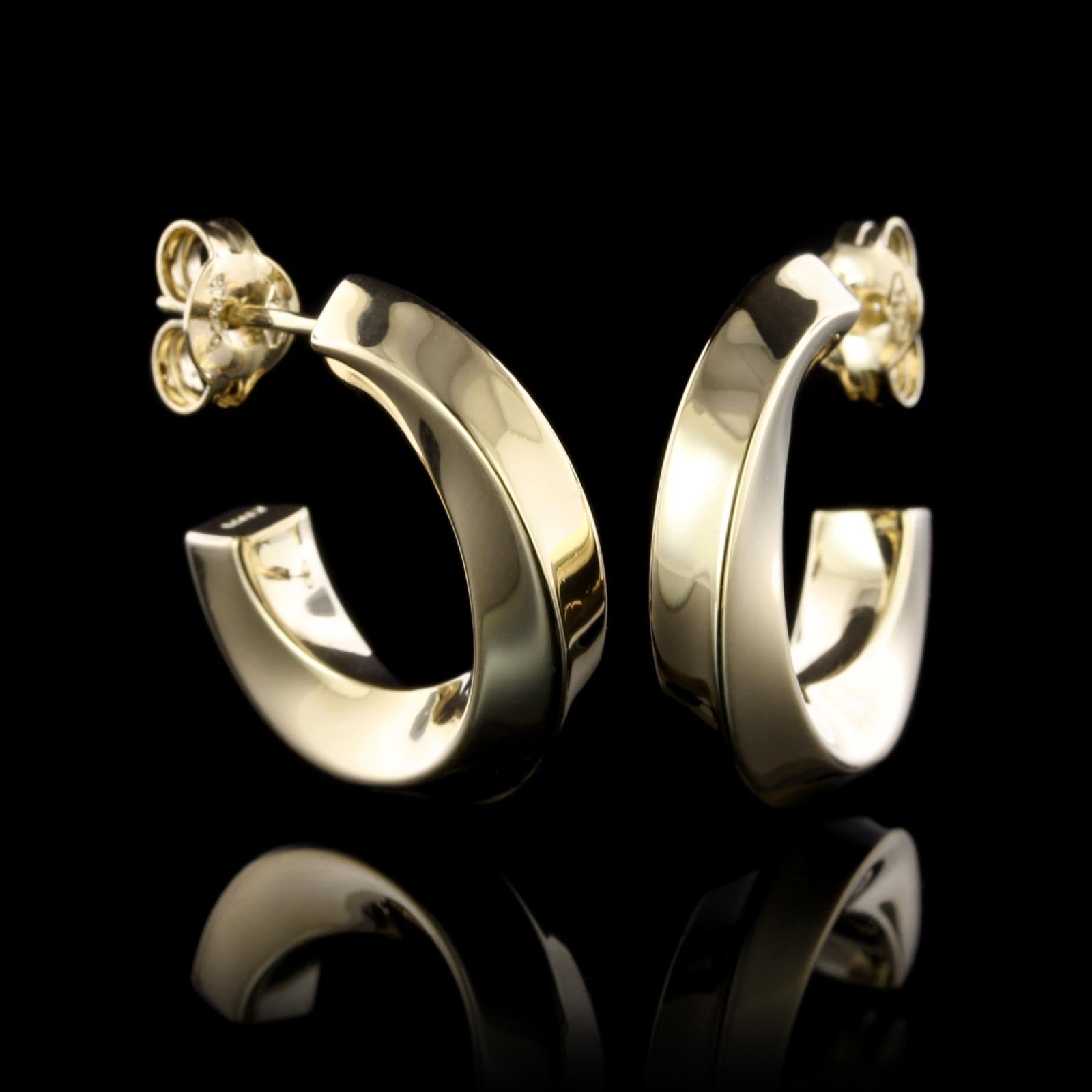 Tiffany & Co. 18K Yellow Gold Twist Hoop Earrings. Diameter 3/4