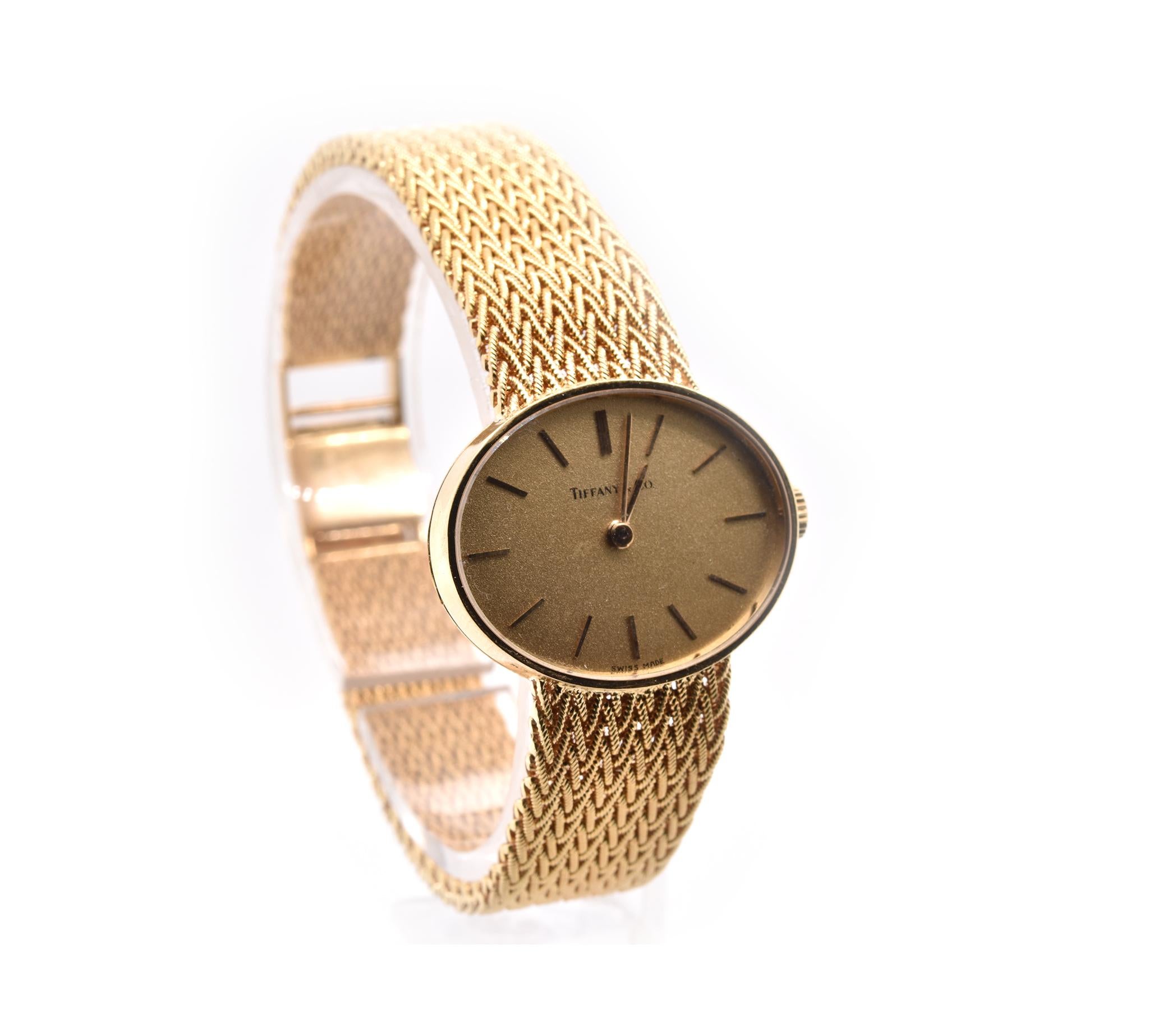 Movement: automatic
Function: hours, minutes
Case: 26mm x 21mm yellow gold case, sapphire crystal, push/pull crown
Band: T&Co yellow gold mesh bracelet with ladder clasp
Dial: champagne dial, gold stick hour markers
Serial#: 53XXX
Reference#: