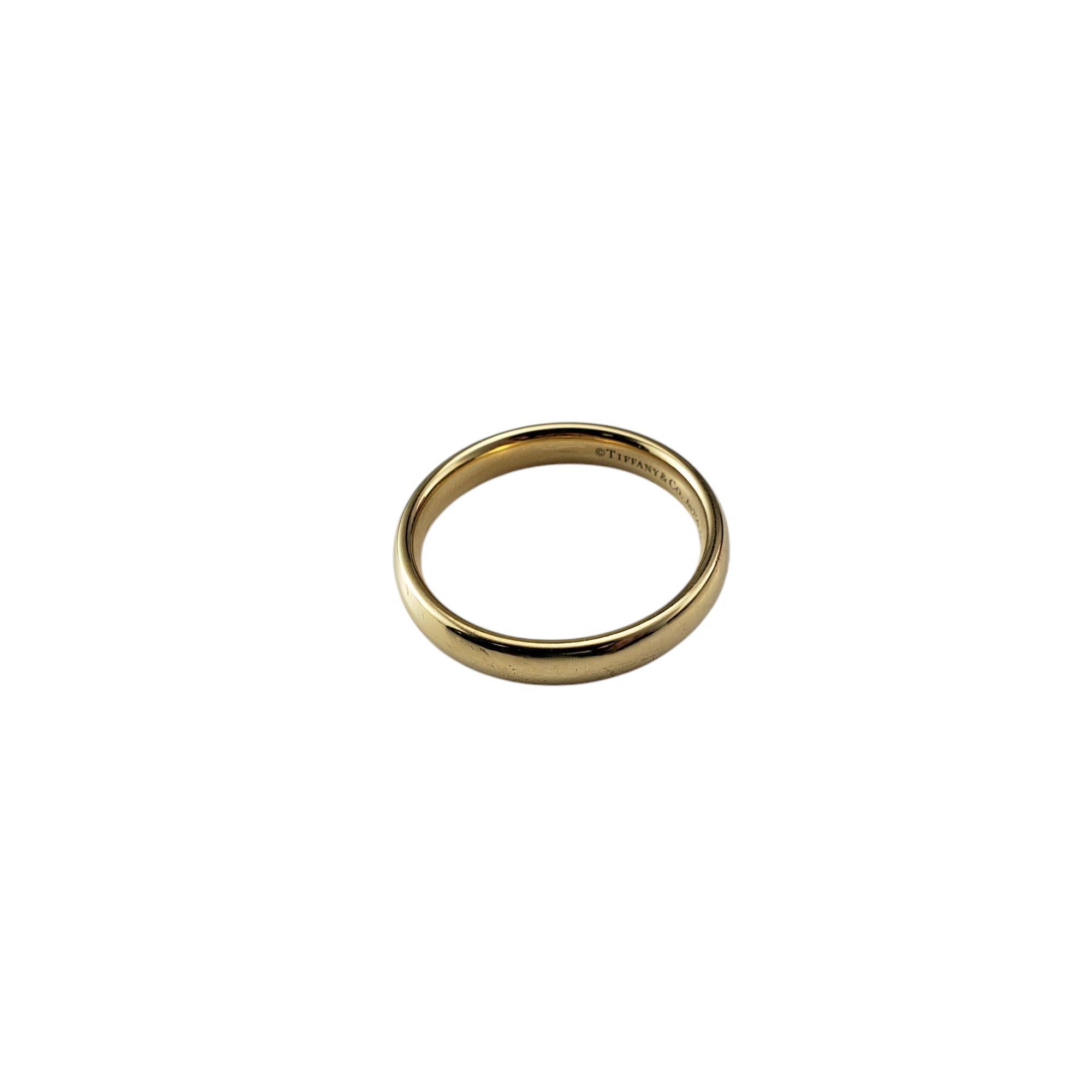 Tiffany & Co. 18K Yellow Gold Wedding Band Ring Size 10

This elegant 18K yellow gold band is a testament to Tiffany & Co.'s commitment to timeless design and exceptional craftsmanship. 

Width: 4 mm.

Ring Size: 10

Weight: 4.3 dwt./6.7