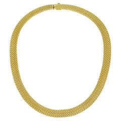 Tiffany & Co. Collier tissé en or jaune 18k.