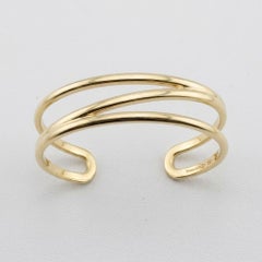 Tiffany & Co. Armreif aus 18-karätigem Gelbgold mit offenem Zickzack-Muster