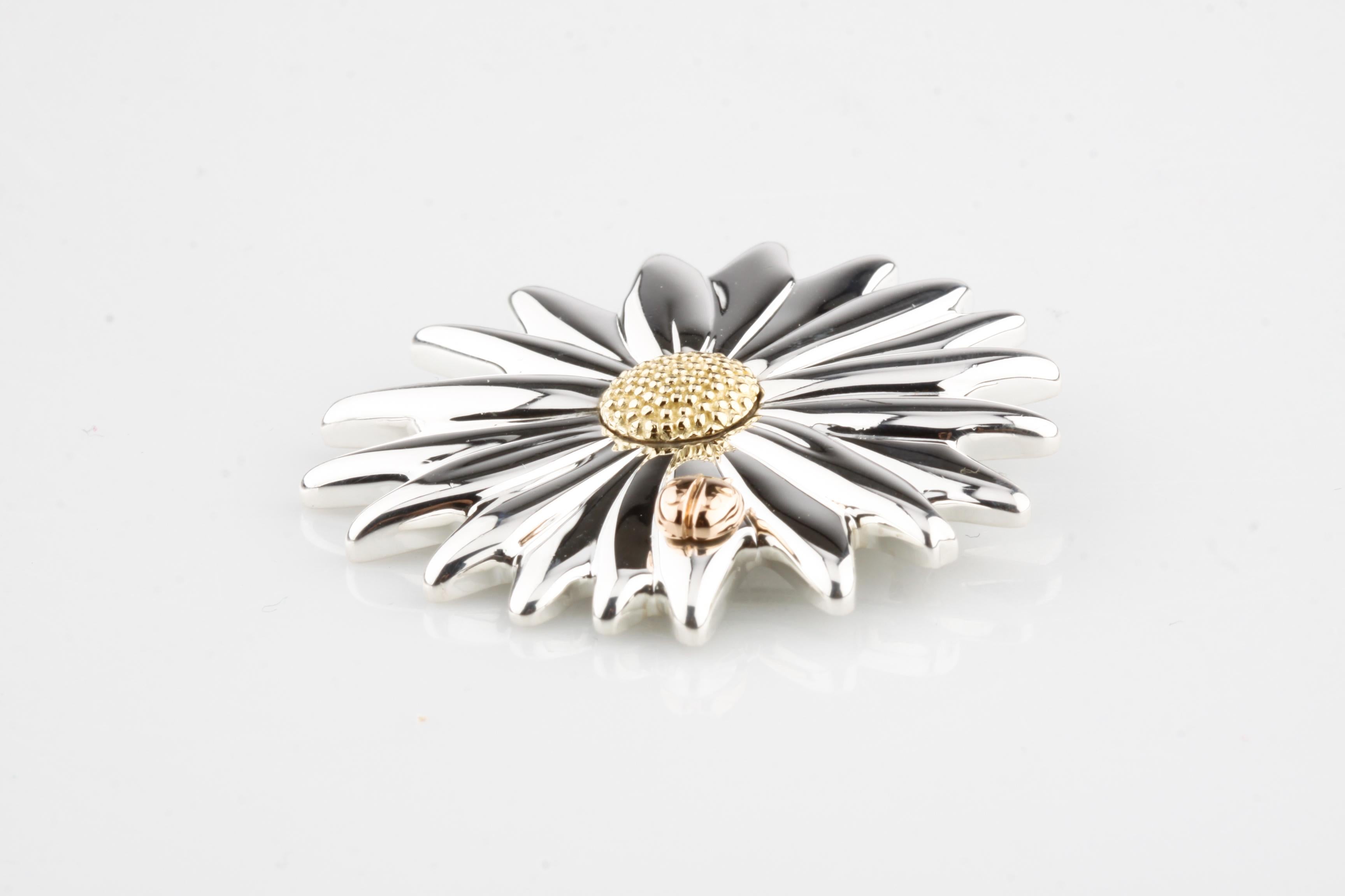 DESIGNER: Tiffany & co. 
METAL: Sterling Silver & 18K Yellow and Rose Gold
SIZE: 2