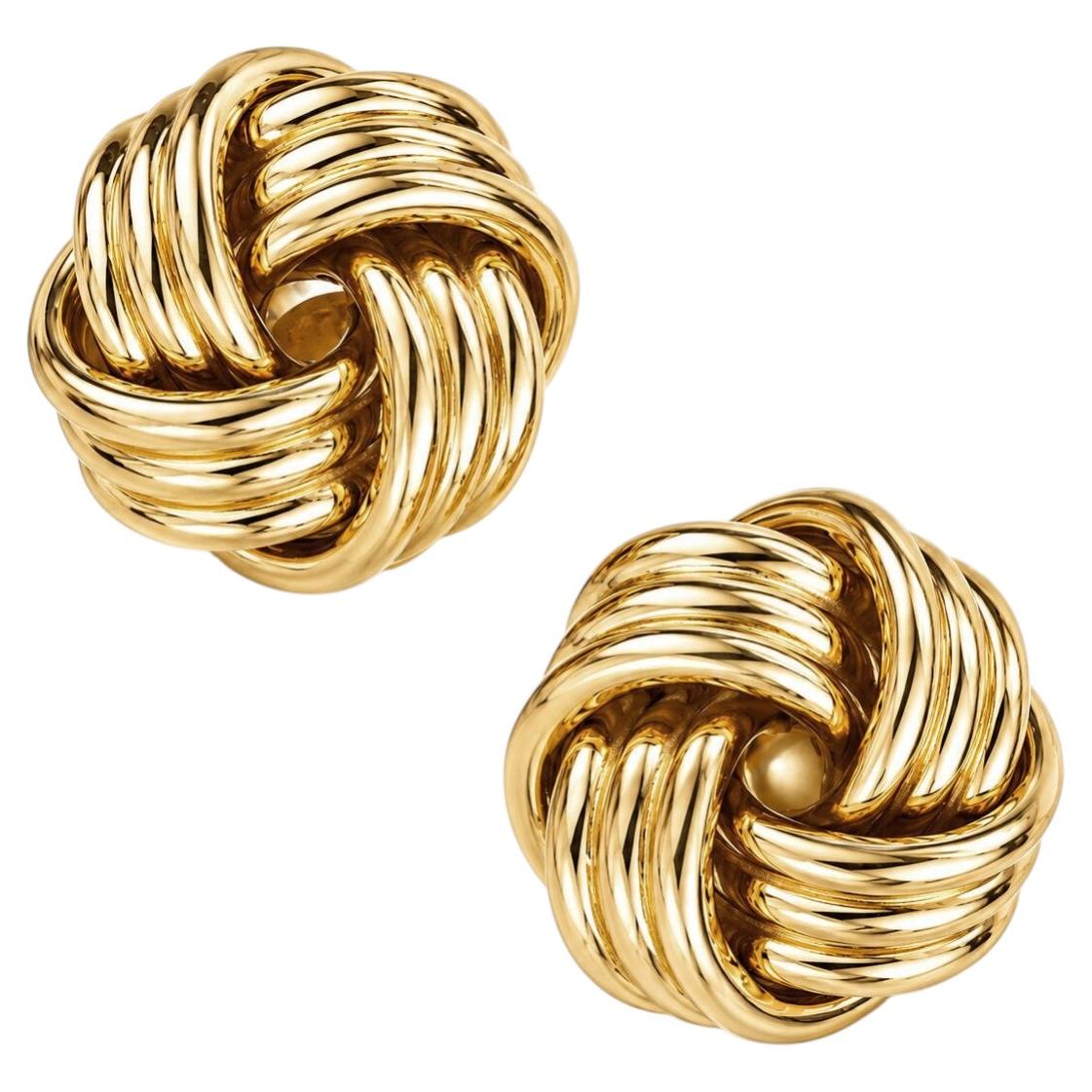 How do you clean Tiffany silver knot earrings?