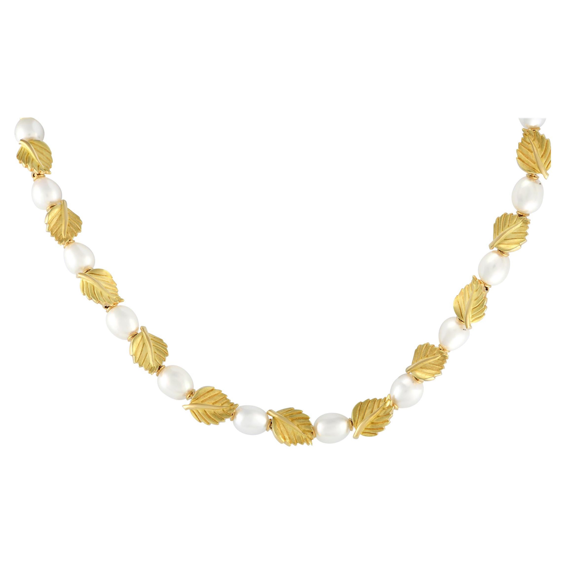 Tiffany 
Co. 18Karat Yellow Gold Pearl Leaf Necklace
