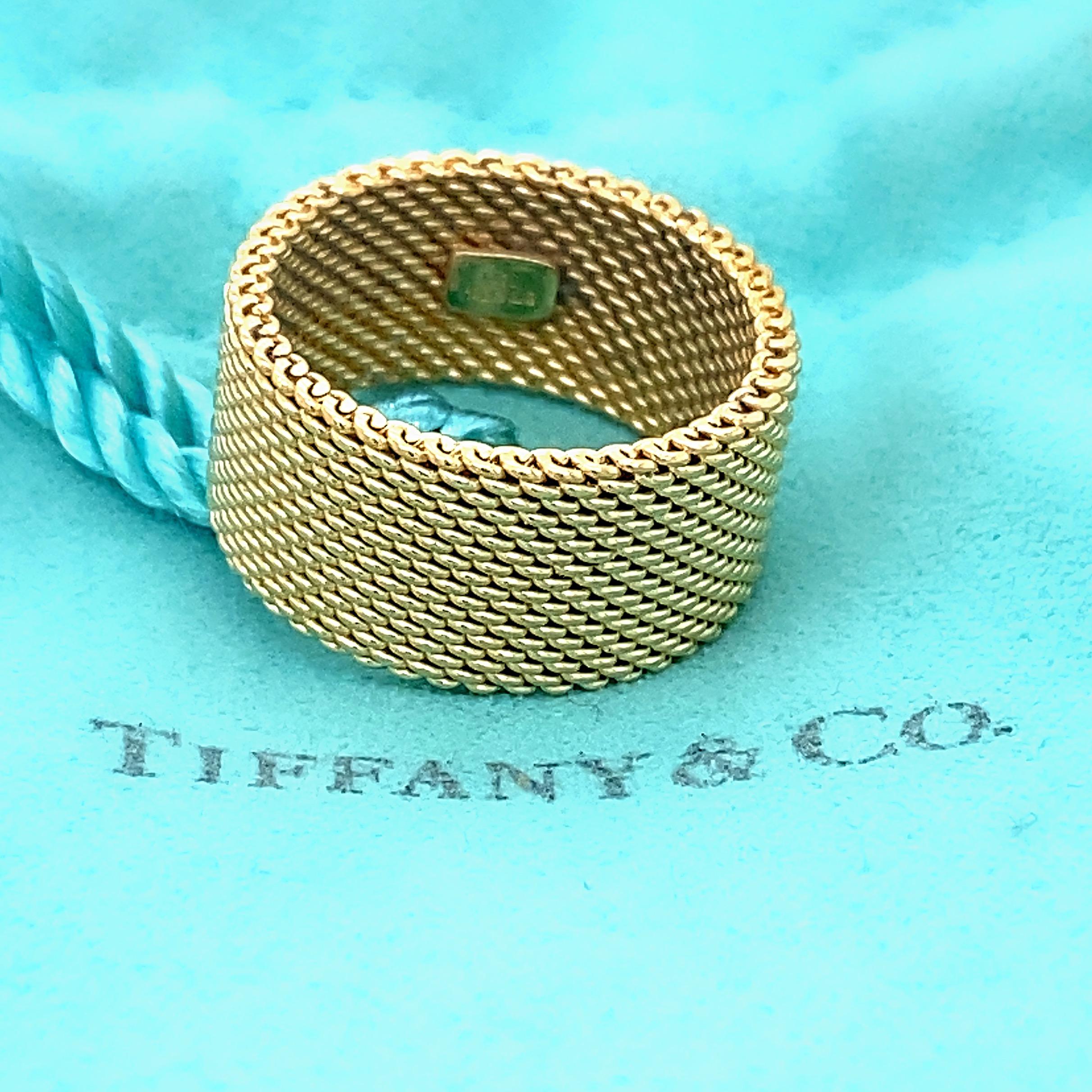 Tiffany & Co. Somerset Mesh Wide Band Ring
Style:  Band
Metal:  18kt Yellow Gold
Size:  5.75 
Width:  10 MM
Hallmark:  ©T&Co. 750
Includes:  T&C Ring Pouch
Retail:  $2,800

Sku#11980TJD032521-5.75