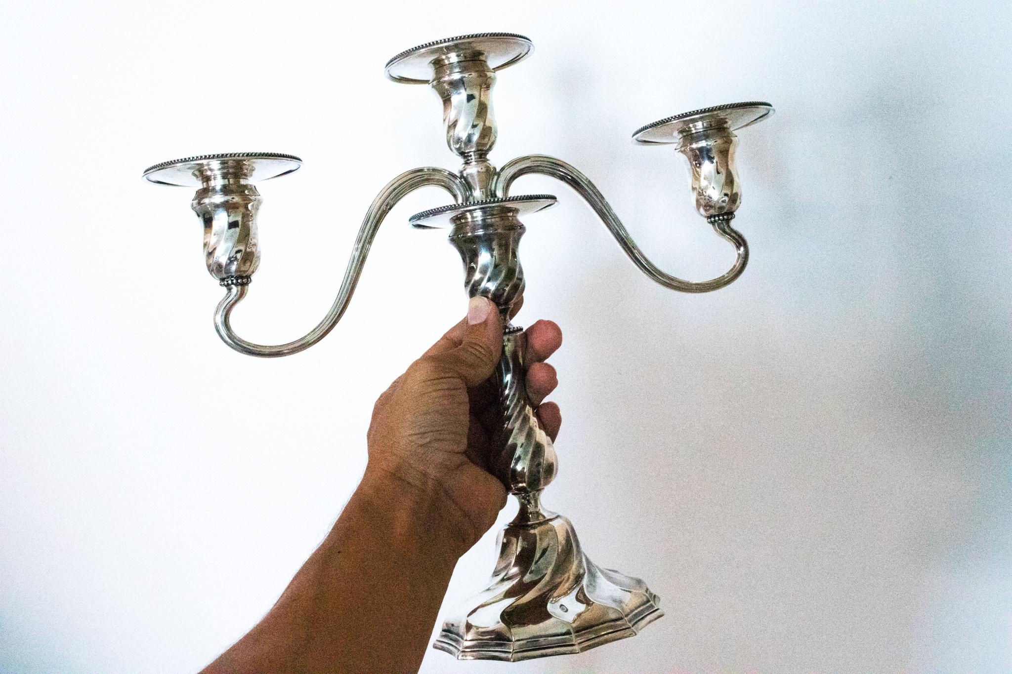 Pair of three-arms candelabras designed by Tiffany & Co.

Beautiful antique pair of candleholders created with Art Nouveau patterns at the Tiffany Studios in New York city, circa 1903. They was crafted under the directory presidency of Charles T.
