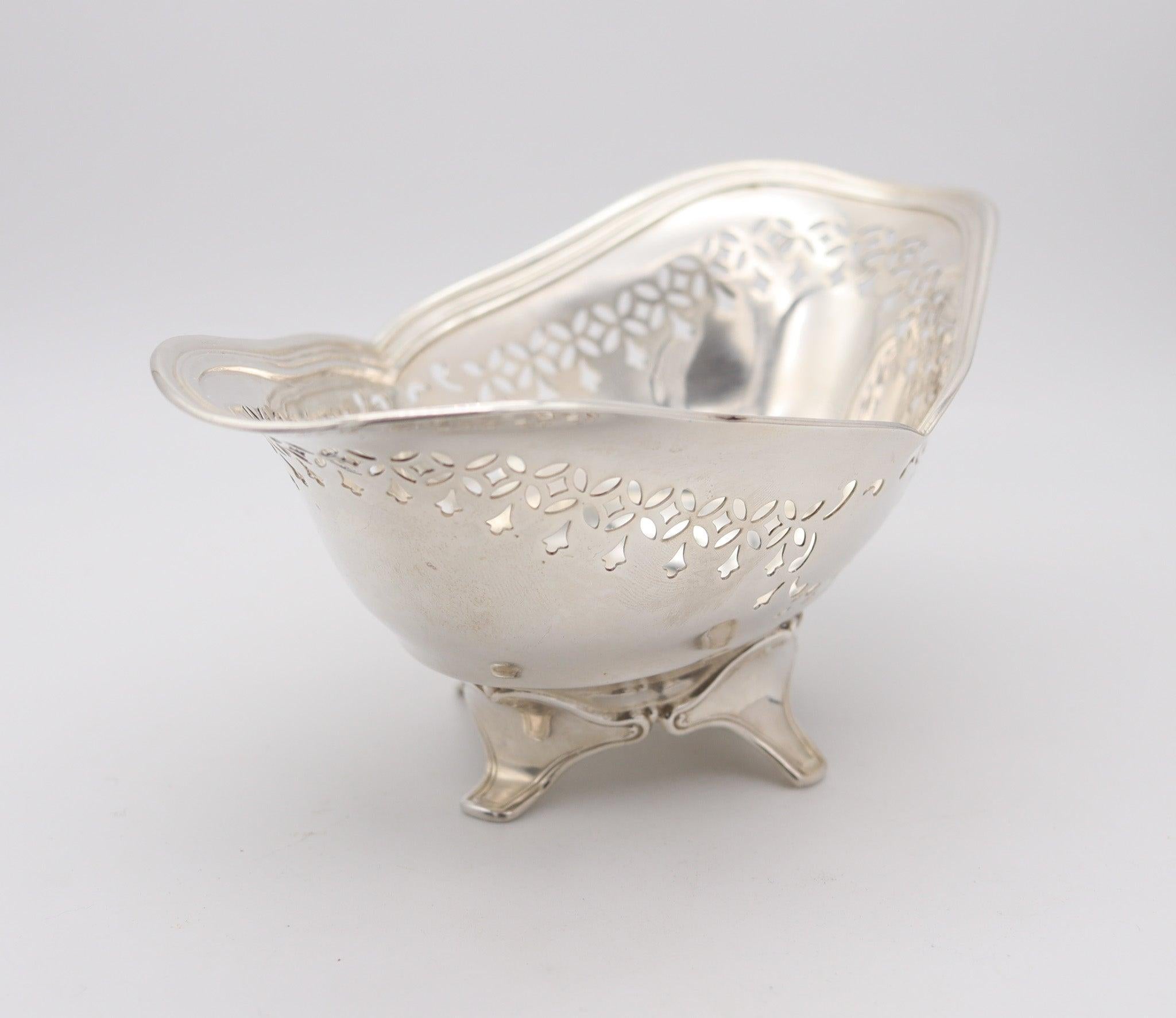 A four-legged dish designed by Tiffany & Co.

This is a beautiful antique Edwardian four-legged open dish for nuts, created in 1907 at Tiffany & Co. in New York city. It was carefully crafted in solid sterling silver .925/.999 under the directory