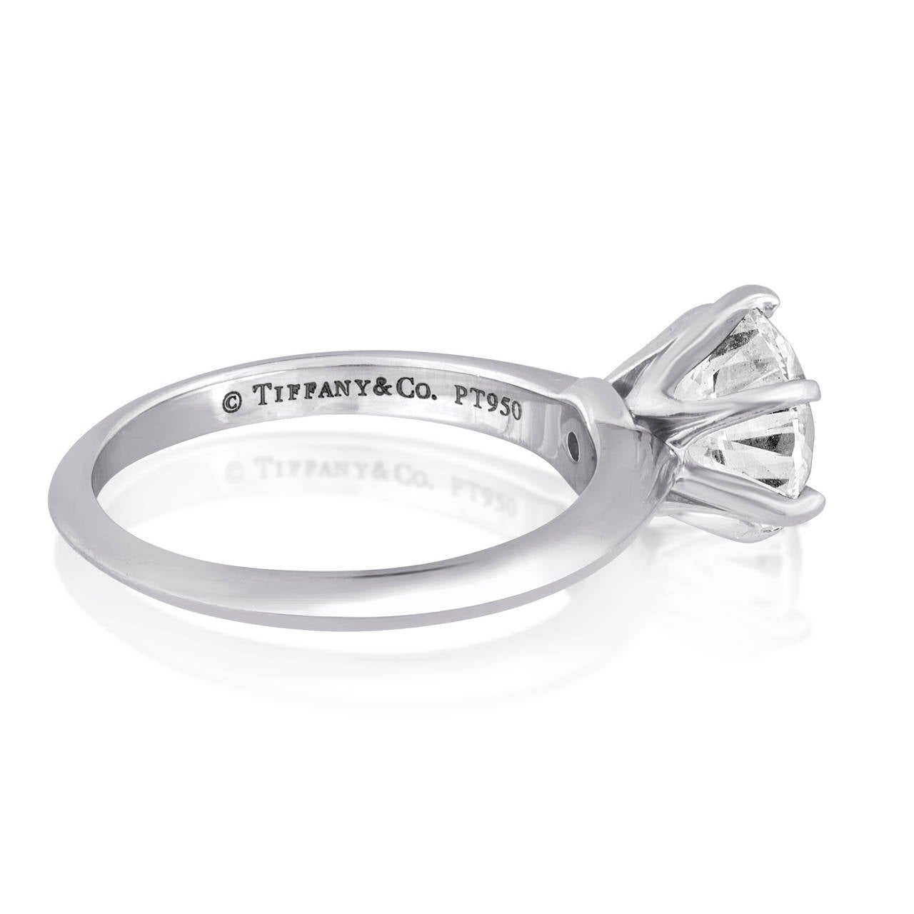 Beautiful Tiffany & Co. Engagement Ring.
The ring is Platinum.
The Diamond is 1.93 Carats G VVS1
The ring is a size 6, not sizable by us.
The ring weighs 5.1 grams.
T&Co. number was blocked out for security purposes, only in pictures
It comes with