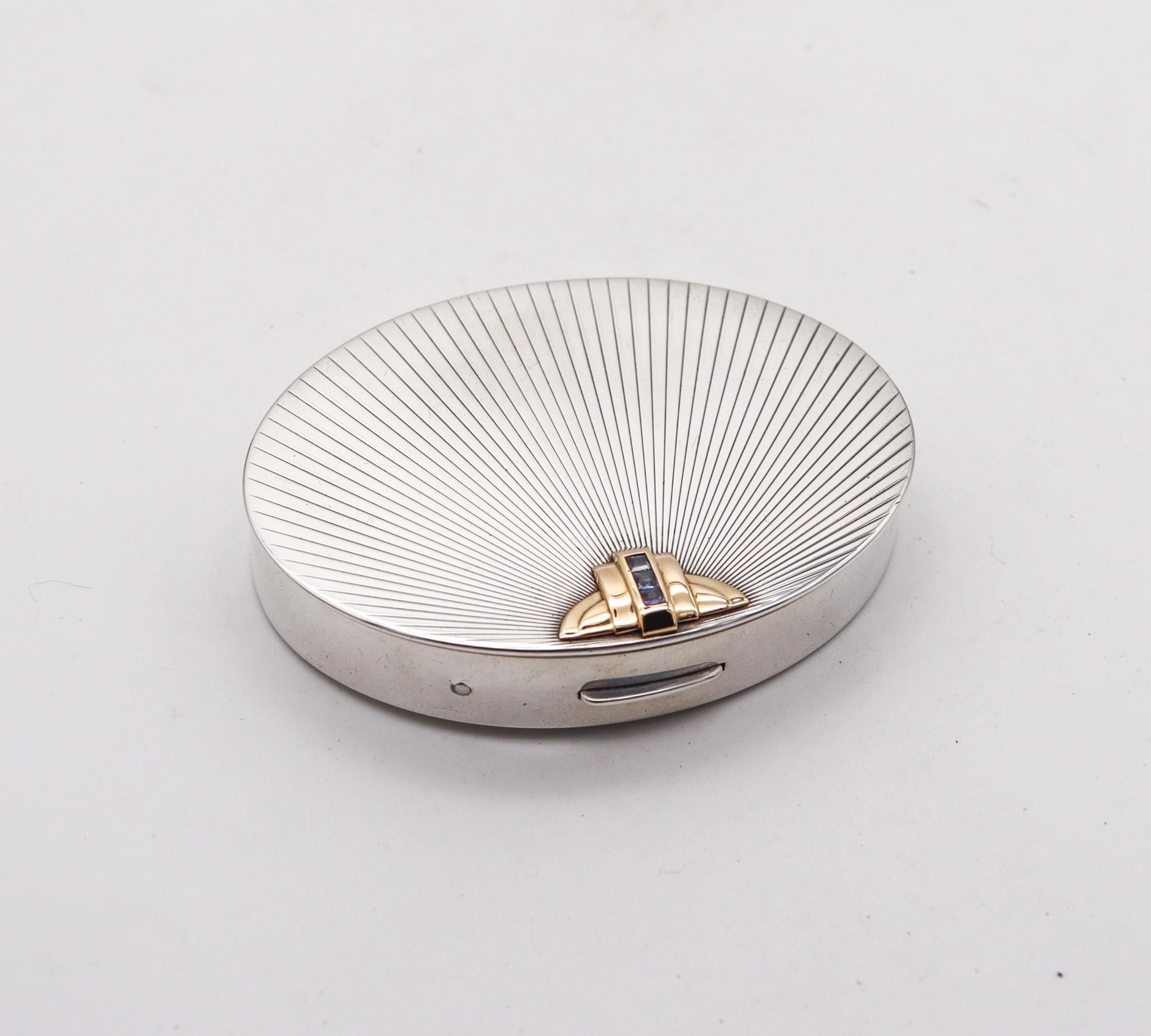 Art deco oval pill box designed by Tiffany & Co.

Very nice oval box, created in New York city at the Tiffany Studios, back in the late 1930's. This box has been crafted in solid .925/.999 sterling silver with an applique in yellow gold of 14