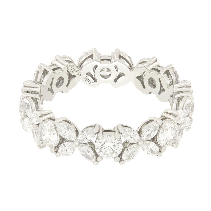 From their Iconic ‘Victoria’ Collection this alternating diamond ring comes from Tiffany & Co. A total of 1.93 carat in diamonds have been set in a pattern of Round brilliant diamonds, set between floral arranged marquise cut diamonds. As to be