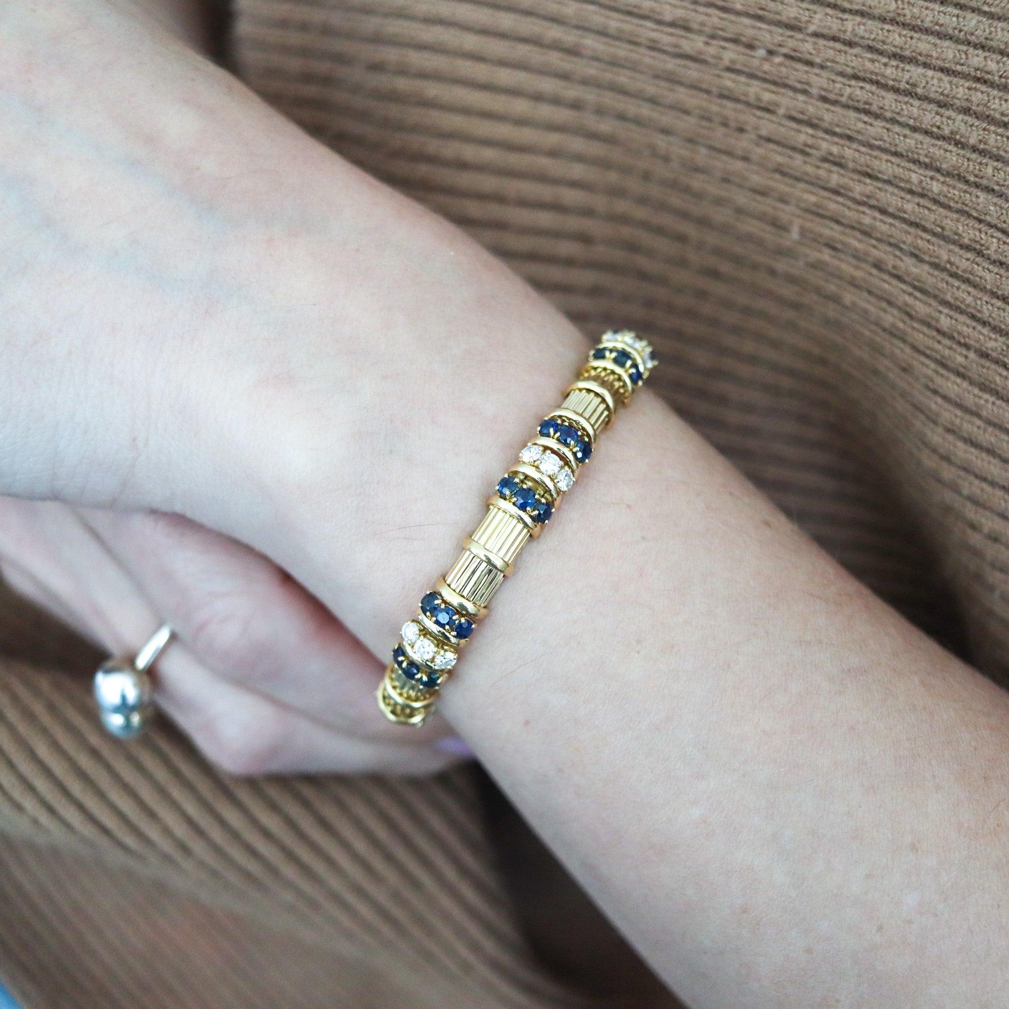 A sculpted bangle bracelet designed by Tiffany & Co.

This is a beautiful bracelet created in New York City by the jewelry house of Tiffany & Co., back in the 1960. The statement bracelet has been crafted with modernist patterns in solid yellow gold