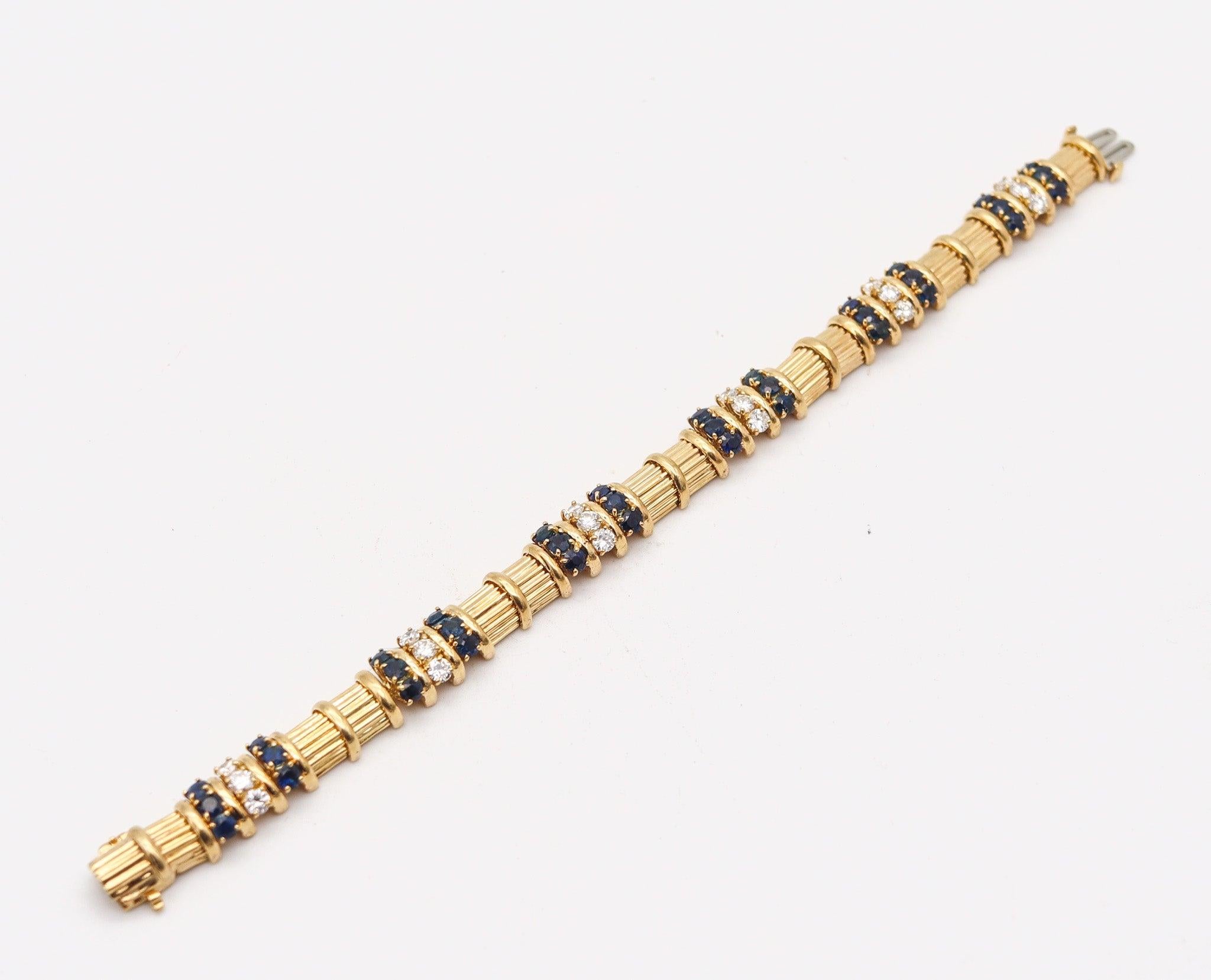 TIFFANY & CO. 1960 Bracelet 18Kt Yellow Gold And 5.76 Ctw Diamonds & Sapphires In Excellent Condition In Miami, FL
