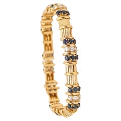 TIFFANY & CO. 1960 Armband aus 18 Karat Gelbgold mit 5,76 Karat Diamanten und Saphiren