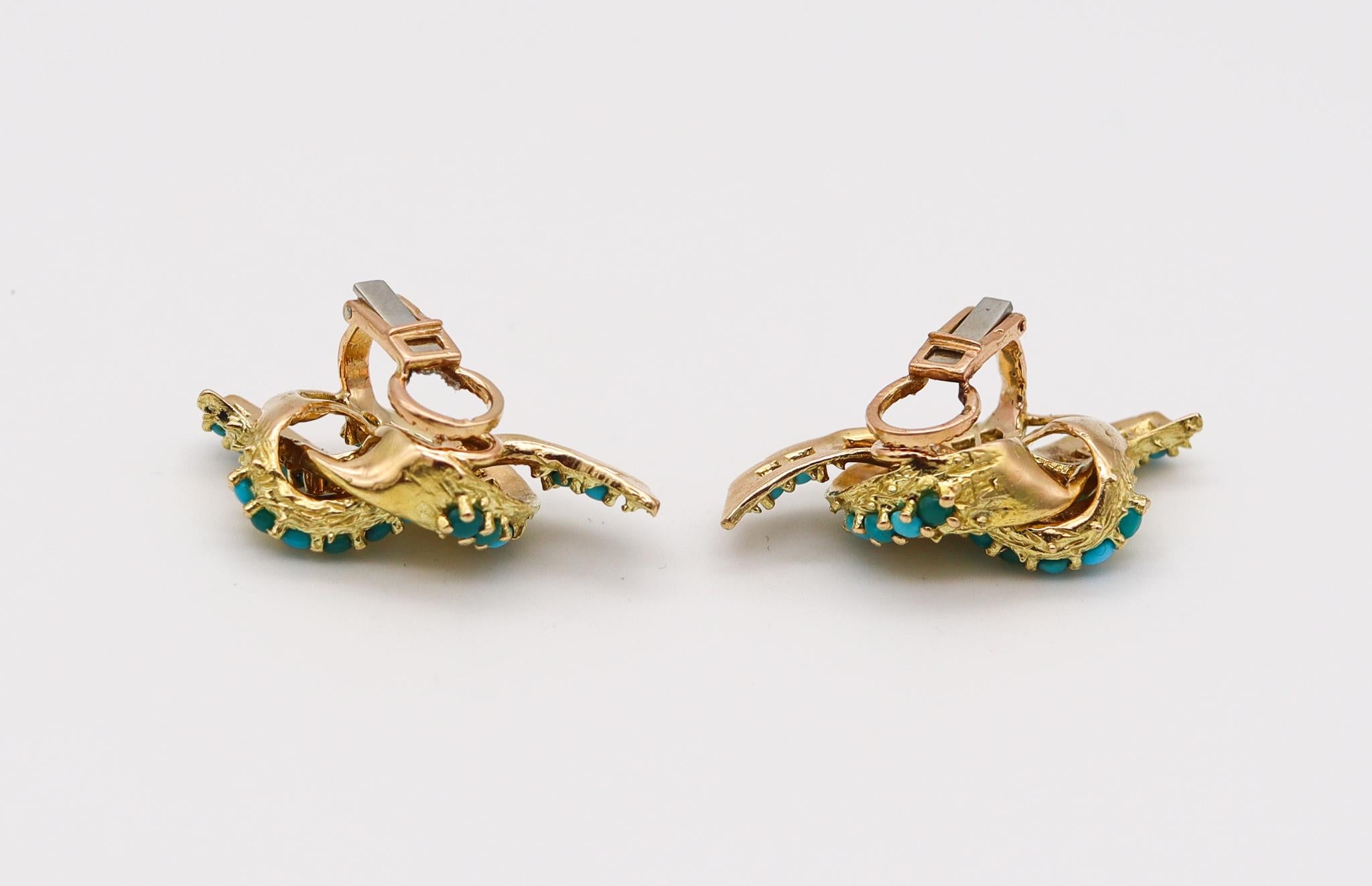 Textured love knots earrings designed by Tiffany & Co. 

Beautiful and unusual pair of clips earrings, created in Paris France for Tiffany & Co. back in the 1960's. These sculptural pair has been crafted in the shape of a love knots in solid yellow