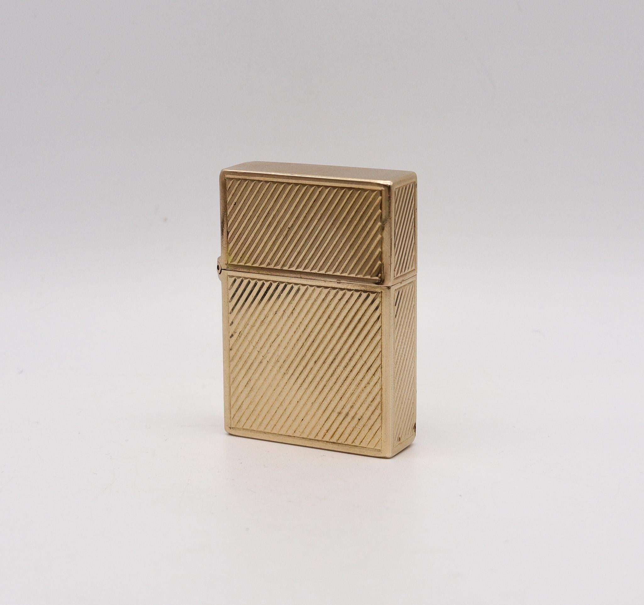 Pocket lighter designed by Tiffany & Co.

Gorgeous luxury pocket lighter, created in New York city by Tiffany & Co, back in the 1960. The lighter's case has been crafted with sharp geometric shapes in solid yellow gold of 14 karats and decorated