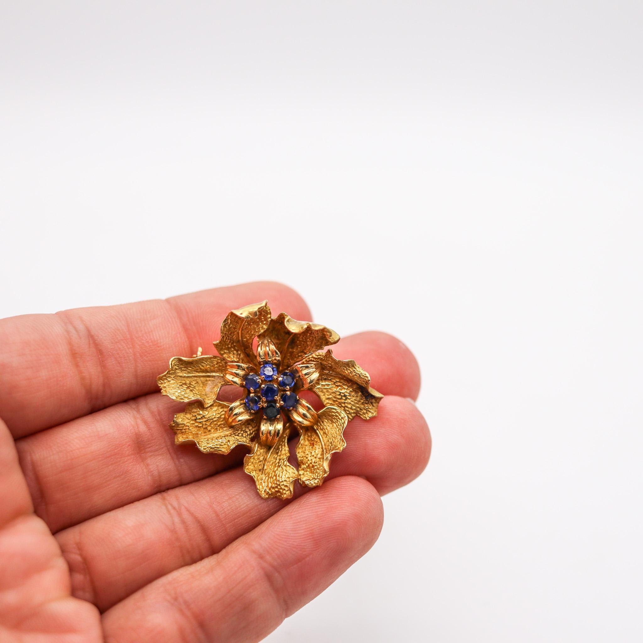 Sculptural brooch designed by Tiffany & Co.

Beautiful vintage piece, created by the Tiffany studios back in the 1960. This retro-modernist brooch has been designed with organic motifs in the shape of an orchid flower. Crafted in solid rich yellow