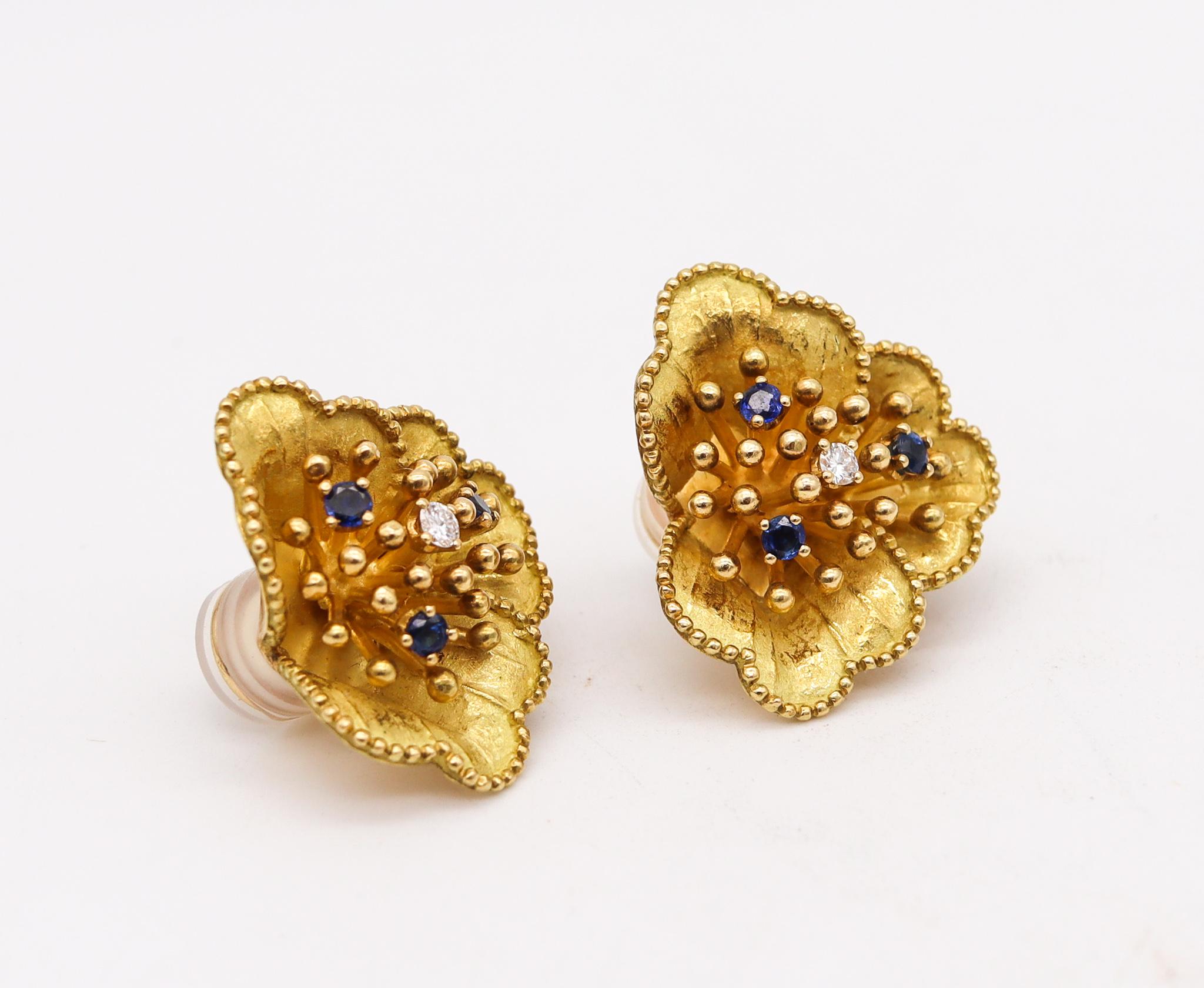 Pair of earrings designed by Tiffany & Co.

Very nice pair of clips earrings, created by Tiffany & Co. back in the 1960's. They was crafted with organic, floreated and dotted patterns in solid yellow gold of 18 karats with textured finish. Fitted