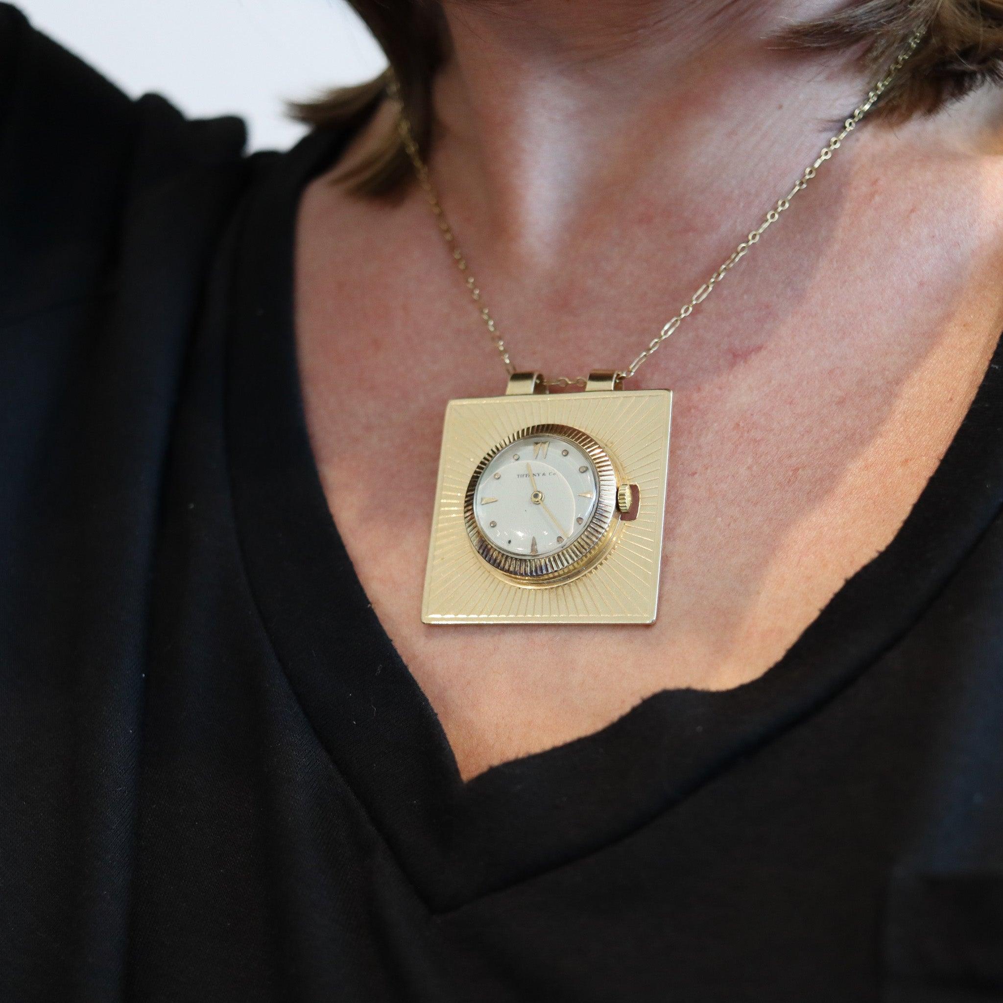 Squared pendant watch designed by Tiffany & Co.

An elegant pendant clock, created in New York by the jewelry house of Tiffany & Co., back in 1960. The pendant was crafted in a squared shape with radiant patterns in the retro-modernist style. It was