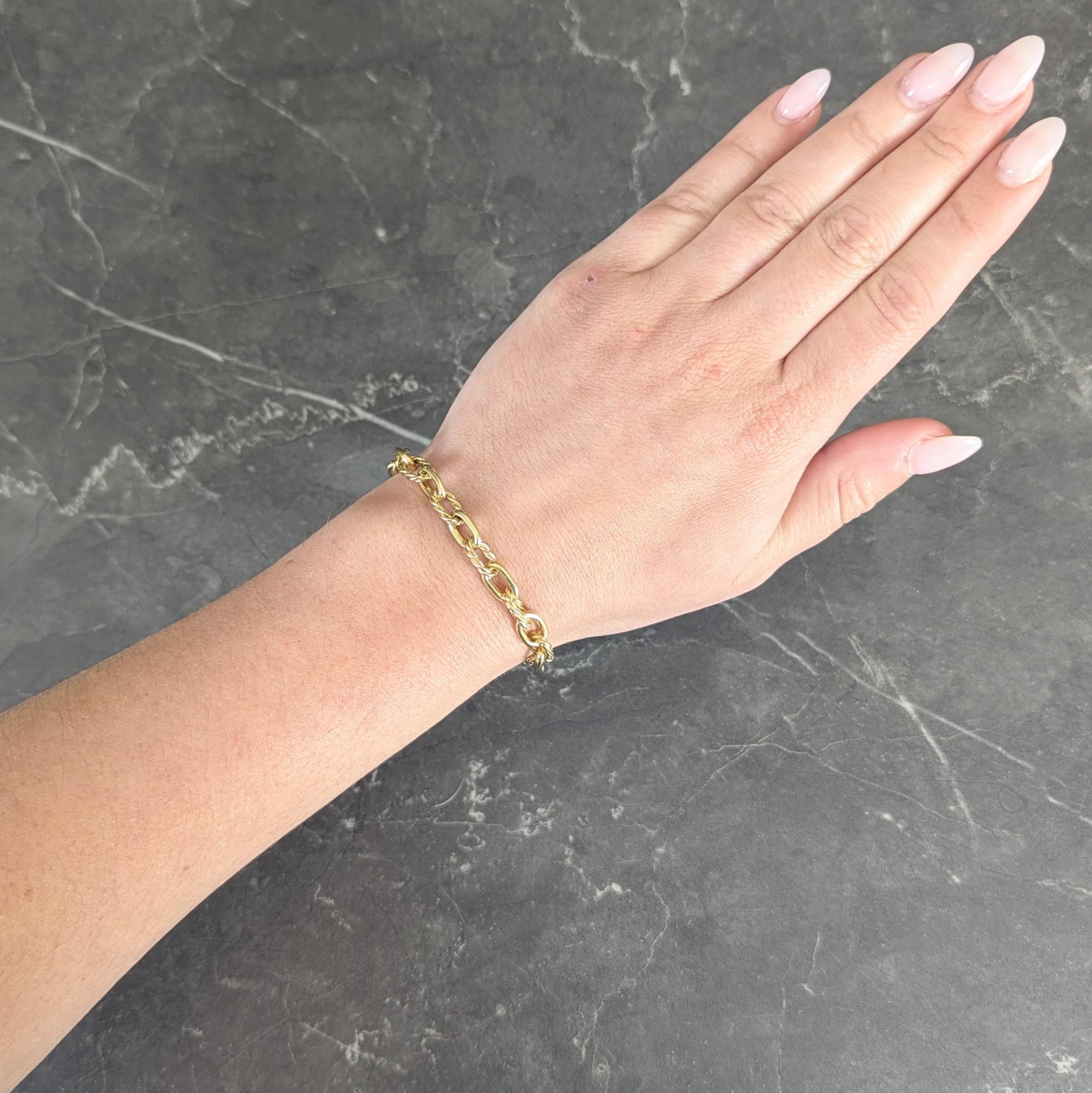 Designed as a yellow gold cable link chain comprised of alternating links
With twisted rope and smooth oval links
Completed by lobster clasp closure
With hinged figure eight safety
Stamped for 18 karat gold
Fully signed for Tiffany & Co.
Circa: