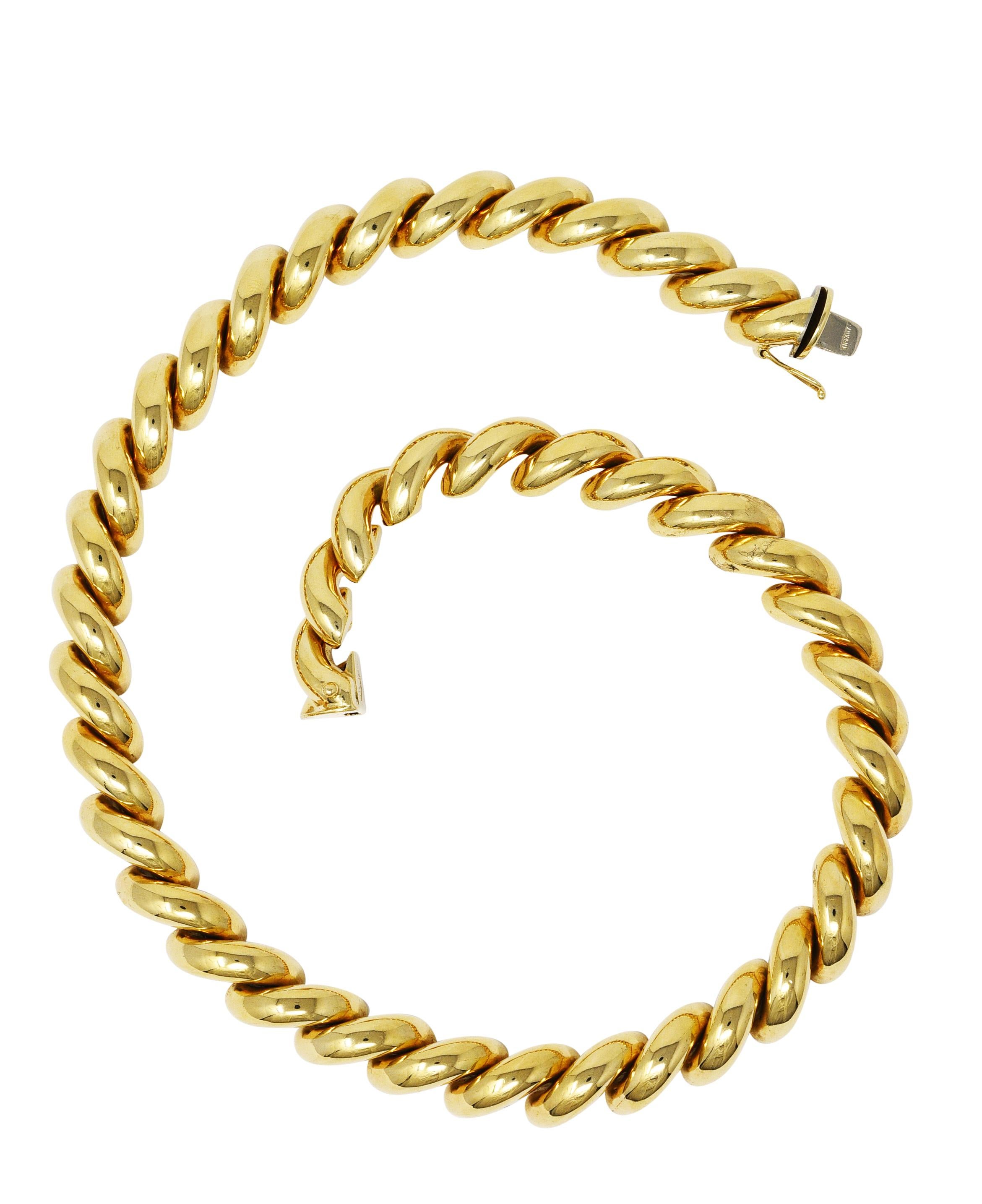 Comprised of puffed half-round links arranged as a twist motif. Featuring a high polished finish. Completed by hidden clasp closure with figure eight safety. Stamped 14k for 14 karat gold. Fully signed Tiffany, Italy. Circa: 1960's. Width at widest:
