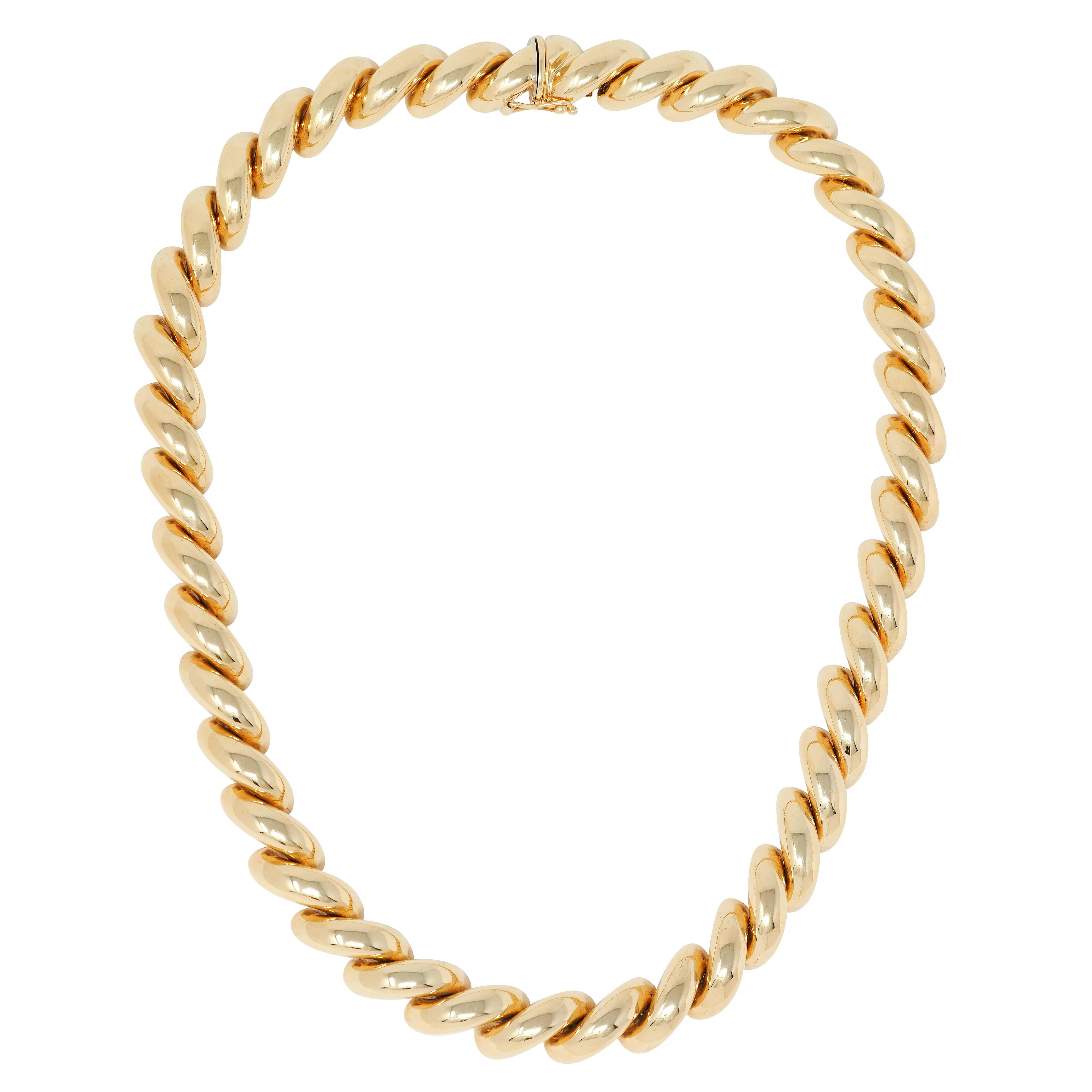 Comprised of puffed half-round links arranged as a twist motif
Featuring a high polished finish
Completed by hidden clasp closure 
With figure eight safety
Stamped 14k for 14 karat gold
Fully signed Tiffany, Italy
Circa: 1960's
Width at widest: 1/2