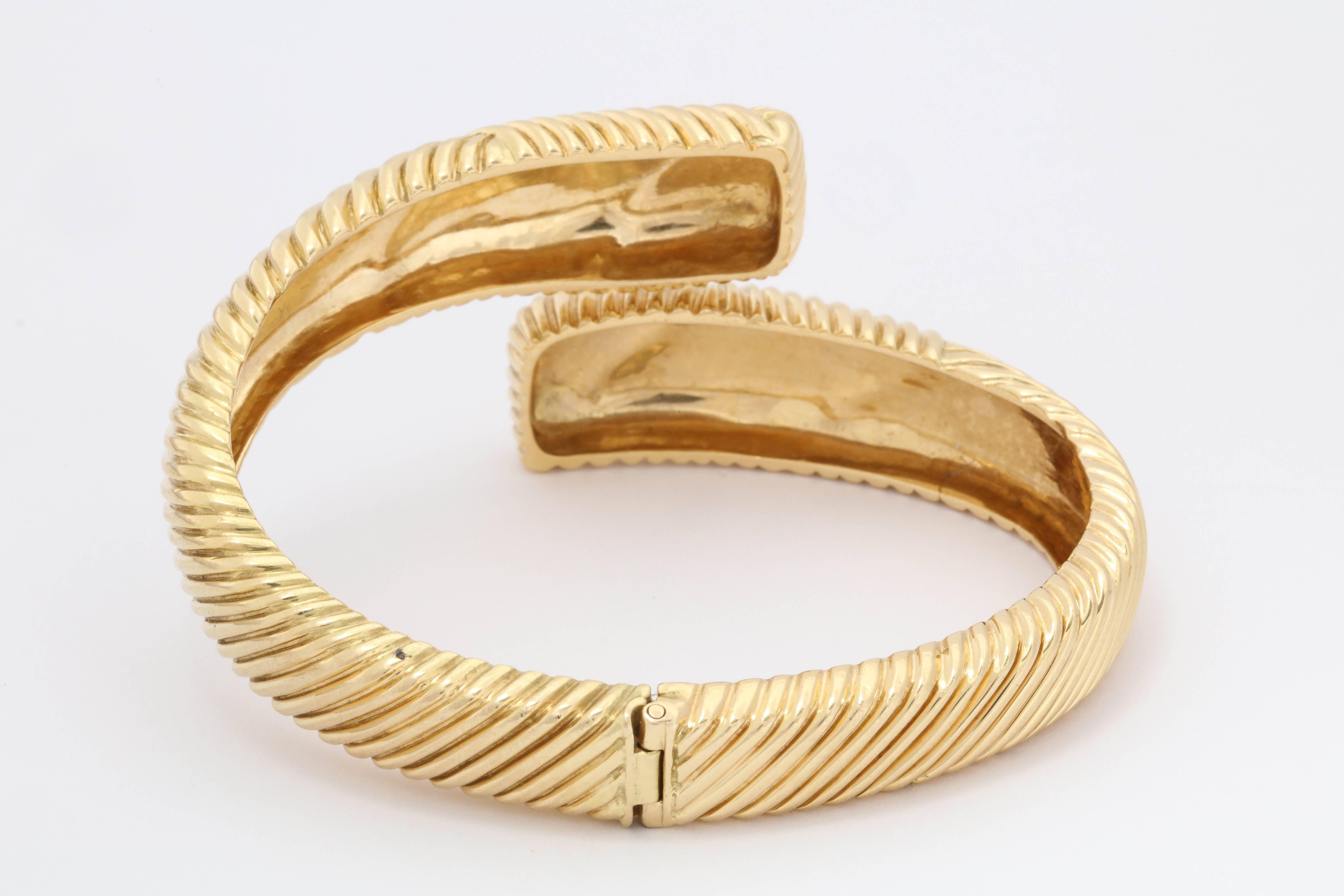 Tiffany & Co. 1960s Stylish Ridge Textured Gold Crossover Hinged Bangle Bracelet 1