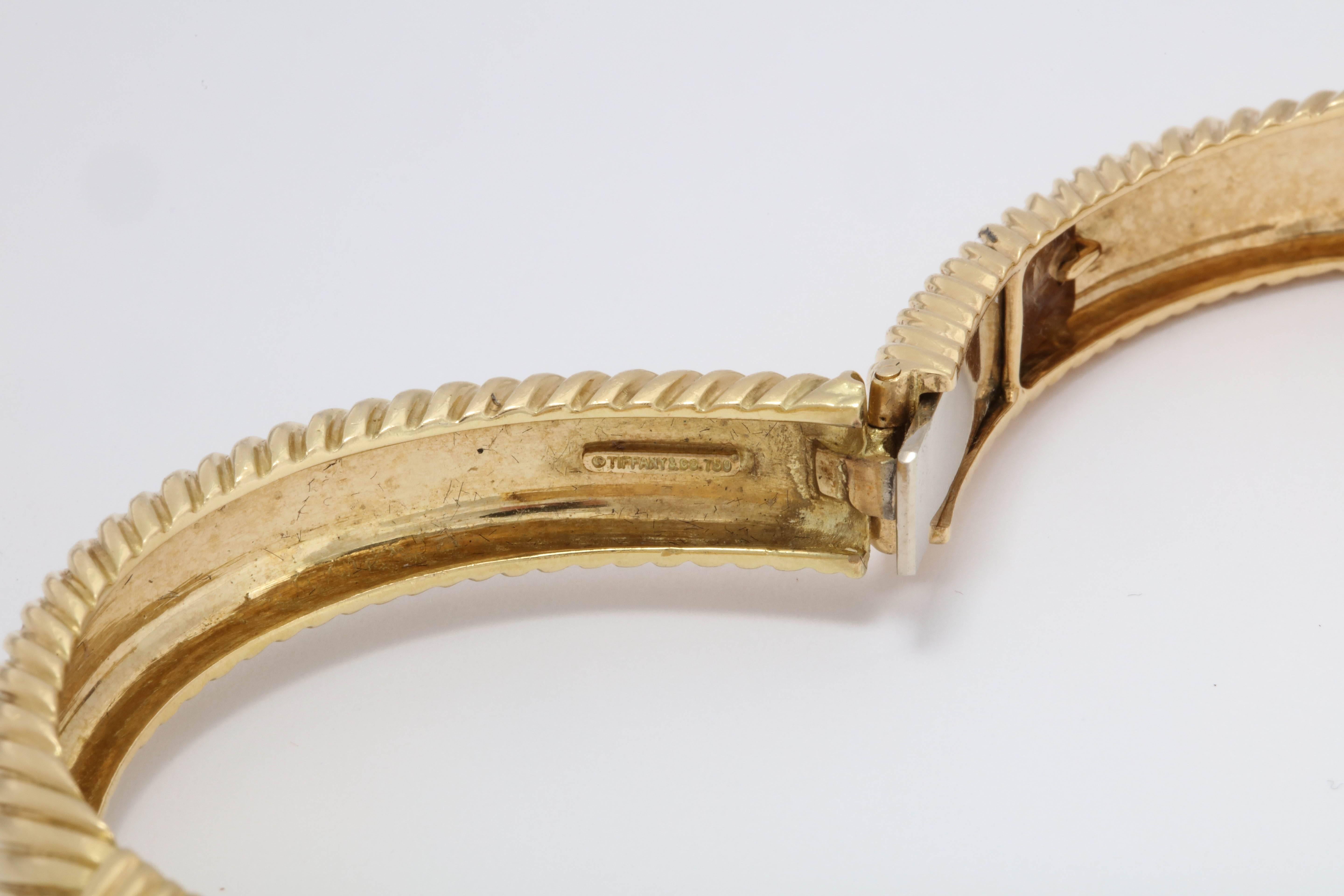 Tiffany & Co. 1960s Stylish Ridge Textured Gold Crossover Hinged Bangle Bracelet 2