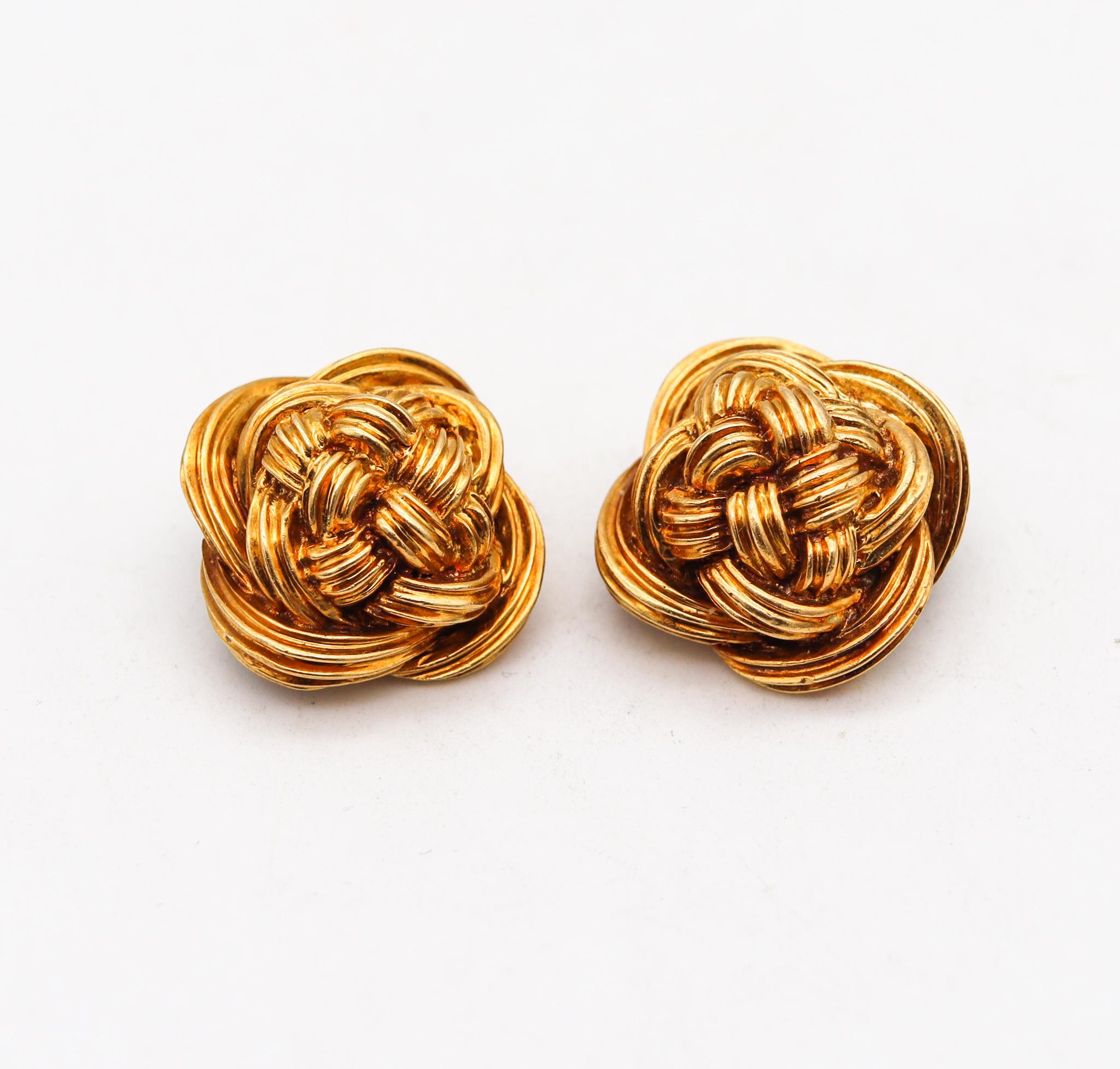 Knots earrings designed by Tiffany & Co.

Beautiful vintage pieces created in New York city at the Tiffany Studios, back in the late 1970's. These clip earrings has been crafted with highly textured patterns in the shape of Celtic knots in solid