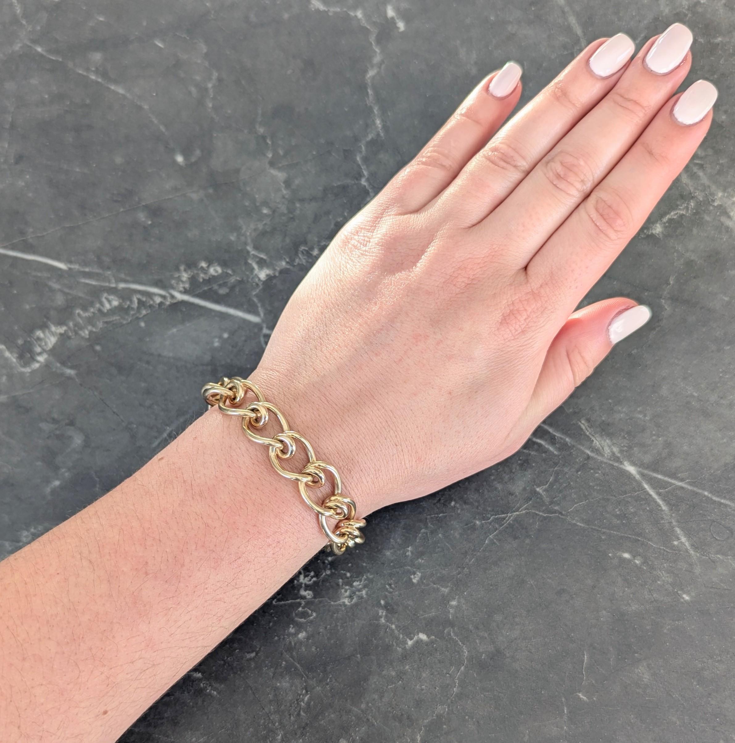 Designed as mousetrap style links with looping detail
With high polish finish
Completed by spring clasp closure
Stamped for 14 karat gold
Fully signed for Tiffany & Co.
Circa: 1980s; via the Loose Loop Collection as seen in the 1980 Tiffany & Co.