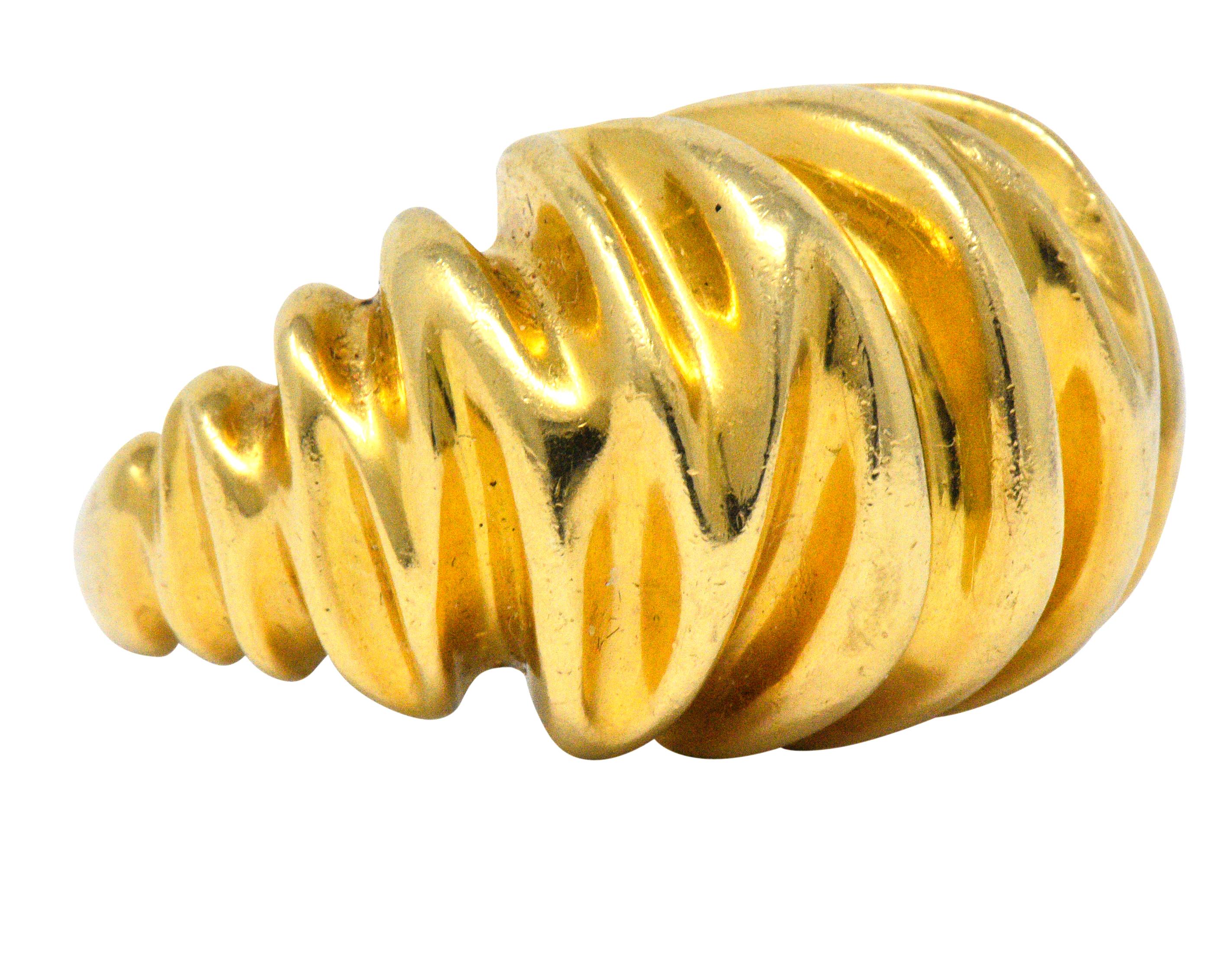 Bombè band ring designed as ruched gold that tapers to shank

Deeply ridged with a bright finish

Fully signed Tiffany & Co.

Stamped 18 Karat for 18 karat gold

Circa 1970s

Ring Size: 7 & sizable

Measures: 17.0 mm wide and sits 13.0 mm