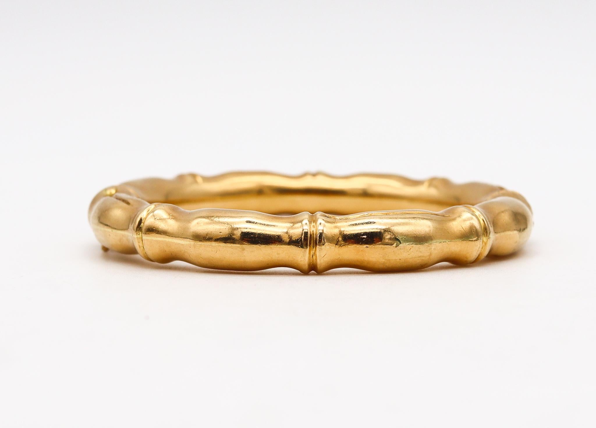 Bamboo bangle bracelet designed Carlo Weingrill for Tiffany & Co.

Very rare Tiffany & Co. Bamboo Bangle Bracelet created circa 1970's. It was crafted from solid yellow gold of 18 karats featuring a bamboo pattern with eight nodes and even