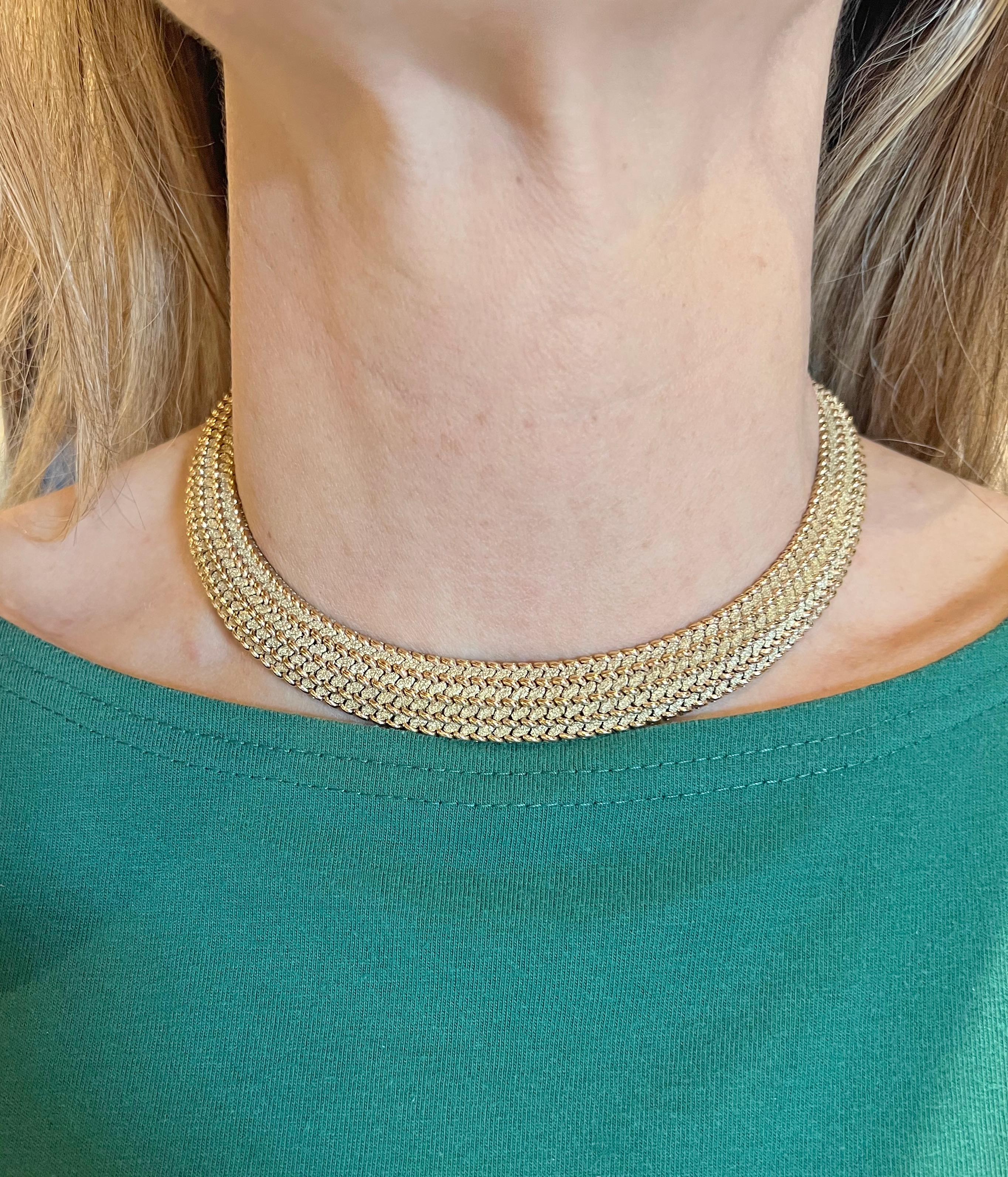 Woven 14k yellow gold mesh collar necklace, featuring a curved design with five rows of raised polished beaded accents with a textured finish in between.  Signed 'TIFFANY & CO' and 'S14KS' on the tongue of clasp.  Safety latch on one side of clasp