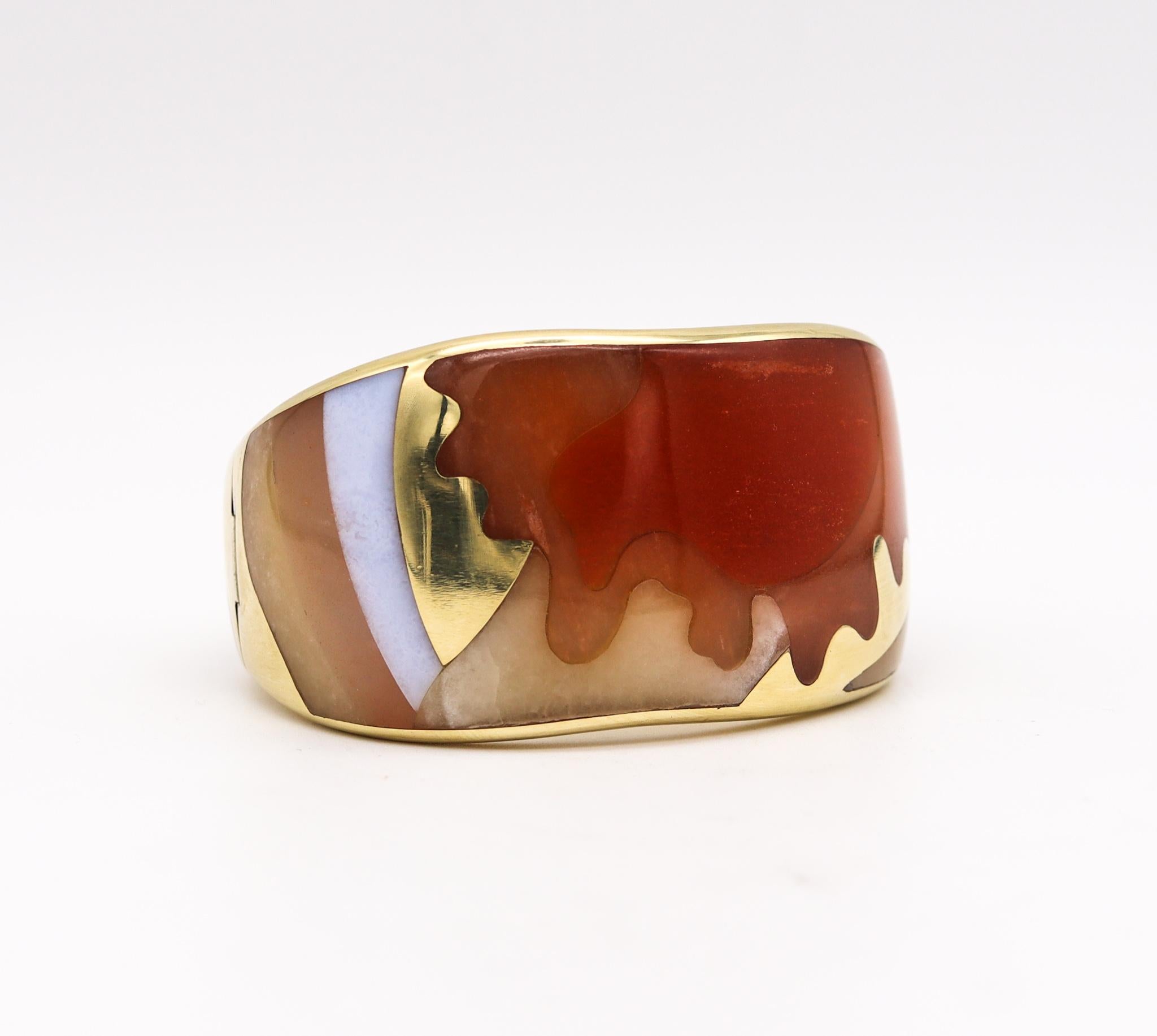 Bangle bracelet designed by Angela Cummings for Tiffany & Co.

An exceptional sculptural piece, created in New York city by the iconic Angela Cummings for the Tiffany Studios, back in the 1977. This colorful bangle bracelet is extremely rare and has
