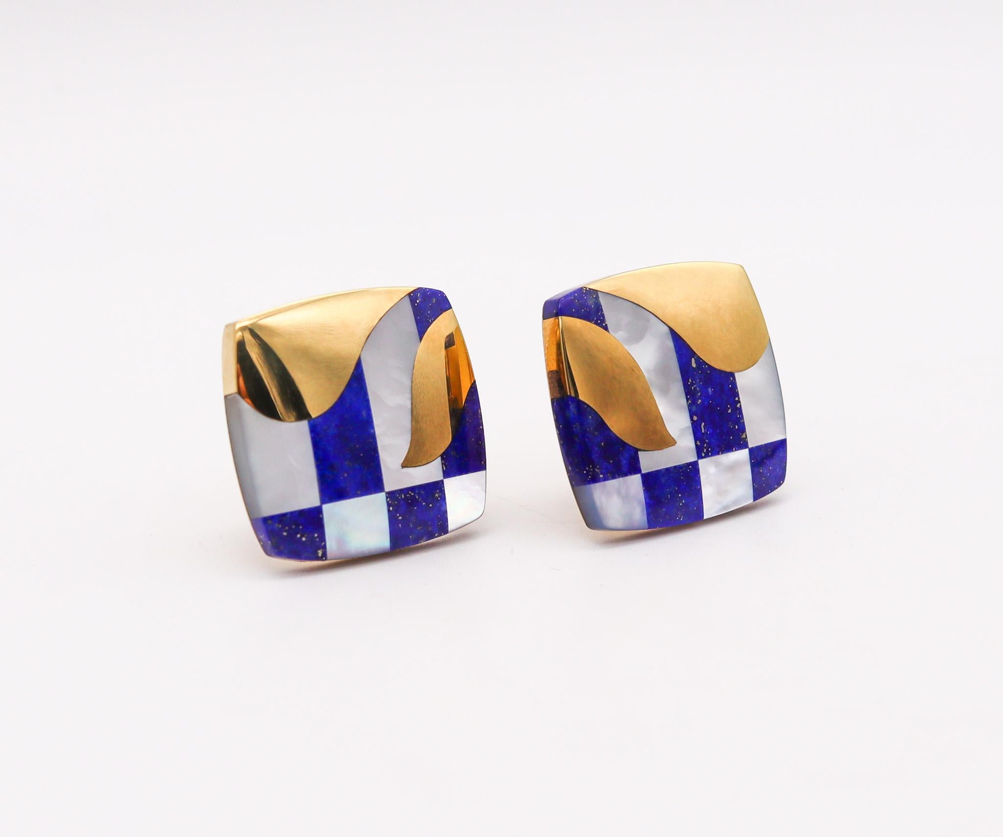 Inlaid geometric earrings designed by Angela Cummings for Tiffany & Co.

Wonderful pieces created in New York city by Angela Cummings at the Tiffany studios, back in the late 1970's. These square pair of inlaid clips earrings has been crafted in