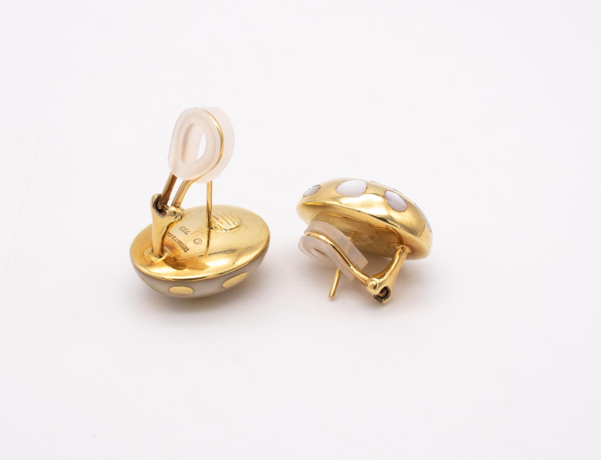 Clips earrings designed by Angela Cummings for Tiffany & Co.

Rare and iconic elegant pieces created back in the 1974 in New York city at the Tiffany & Co. Atelier. This Polka-Dots earrings, was crafted in solid yellow gold of 18 karats, with high