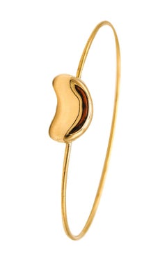 TIFFANY & CO. 1977 Elsa Peretti Bean Bangle Bracelet In Solid 18Kt Yellow Gold