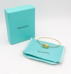 Tiffany & Co 1977 Elsa Peretti Rare Bean Bangle Bracelet in 18Kt Yellow Gold