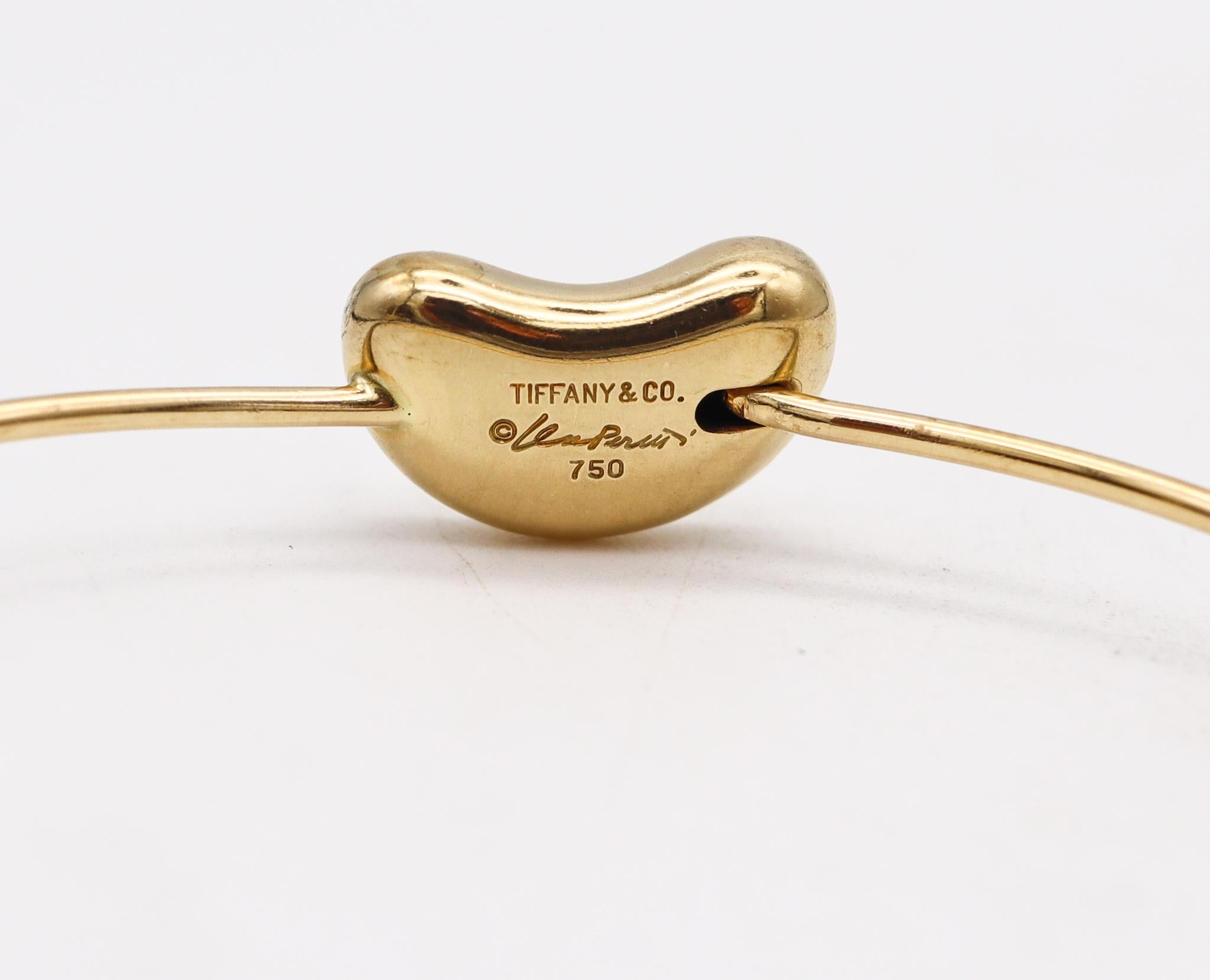 Tiffany & Co 1977 Elsa Peretti Rare Bean Bangle Bracelet in 18Kt Yellow Gold In Excellent Condition In Miami, FL
