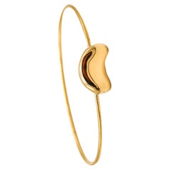 Tiffany & Co 1977 Elsa Peretti Rare Bean Bangle Bracelet in 18Kt Yellow Gold