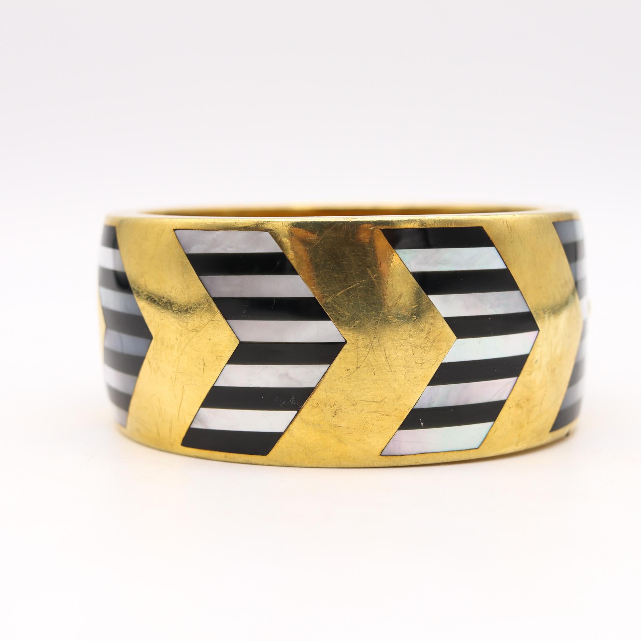 Cabochon Tiffany & Co. 1978 Angela Cummings Geometric Bangle in 18Kt Gold with InlaidGems For Sale