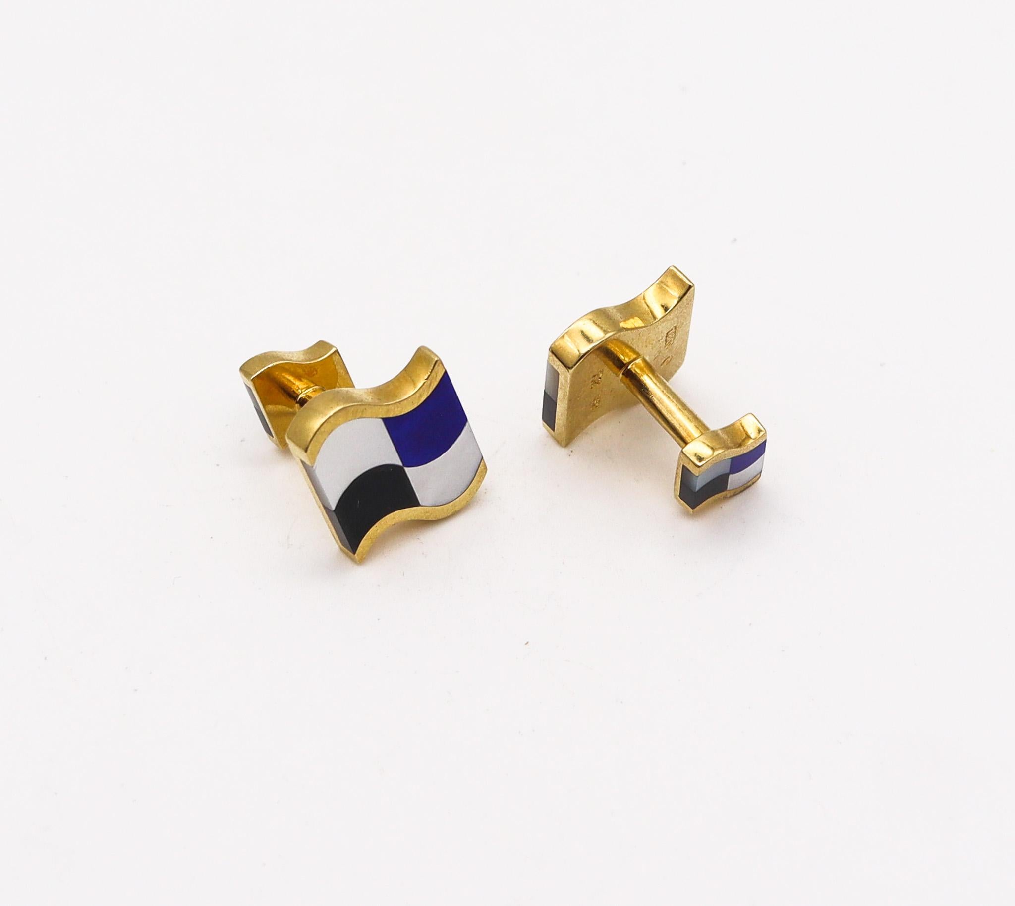 Pair of cufflinks designed by Angela Cummings for Tiffany & Co.

A beautiful and colorful pair of cufflinks, created in New York city by Angela Cummings at the Tiffany & Co. studios, back in the 1980. These cufflinks have been crafted with wavy