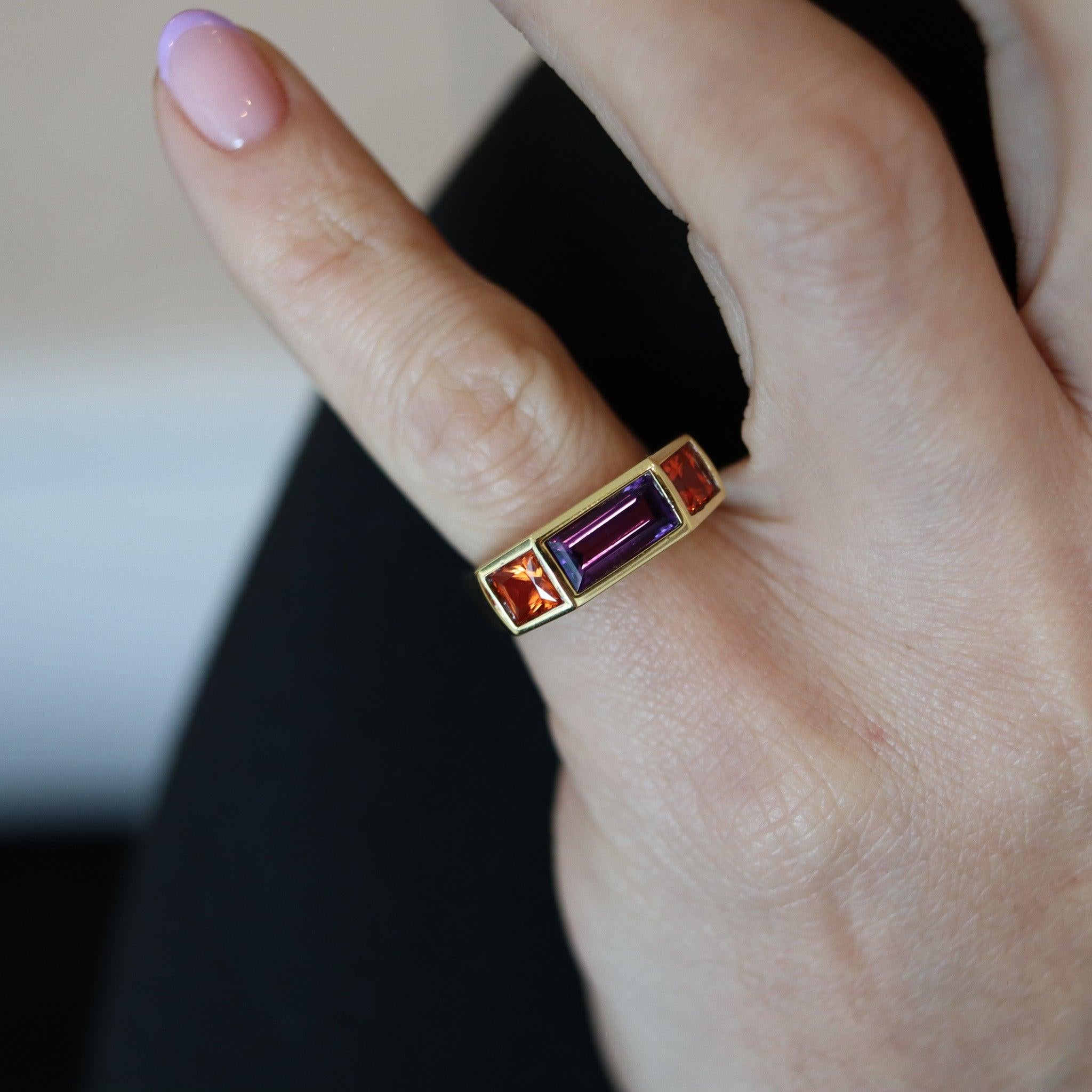 Geometric ring designed by Paloma Picasso for Tiffany & Co.

This is a beautiful three-stones settings ring, created at the Tiffany & Co. Studios in New York city by Paloma Picasso, back in the 1980. This geometric band ring has been carefully