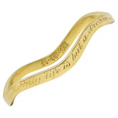 Tiffany & Co. 1980's 18 Karat Yellow Gold Vintage Inscribed Wave Bangle Bracelet