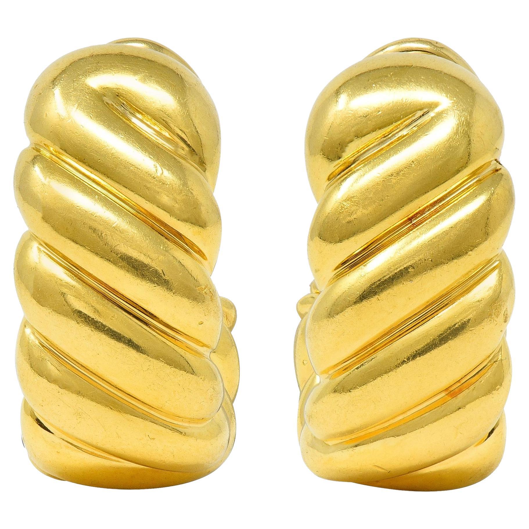 Pendientes Tiffany & Co. de oro amarillo de 18 quilates de la década de 1980, con forma de aro en J giratorio vintage