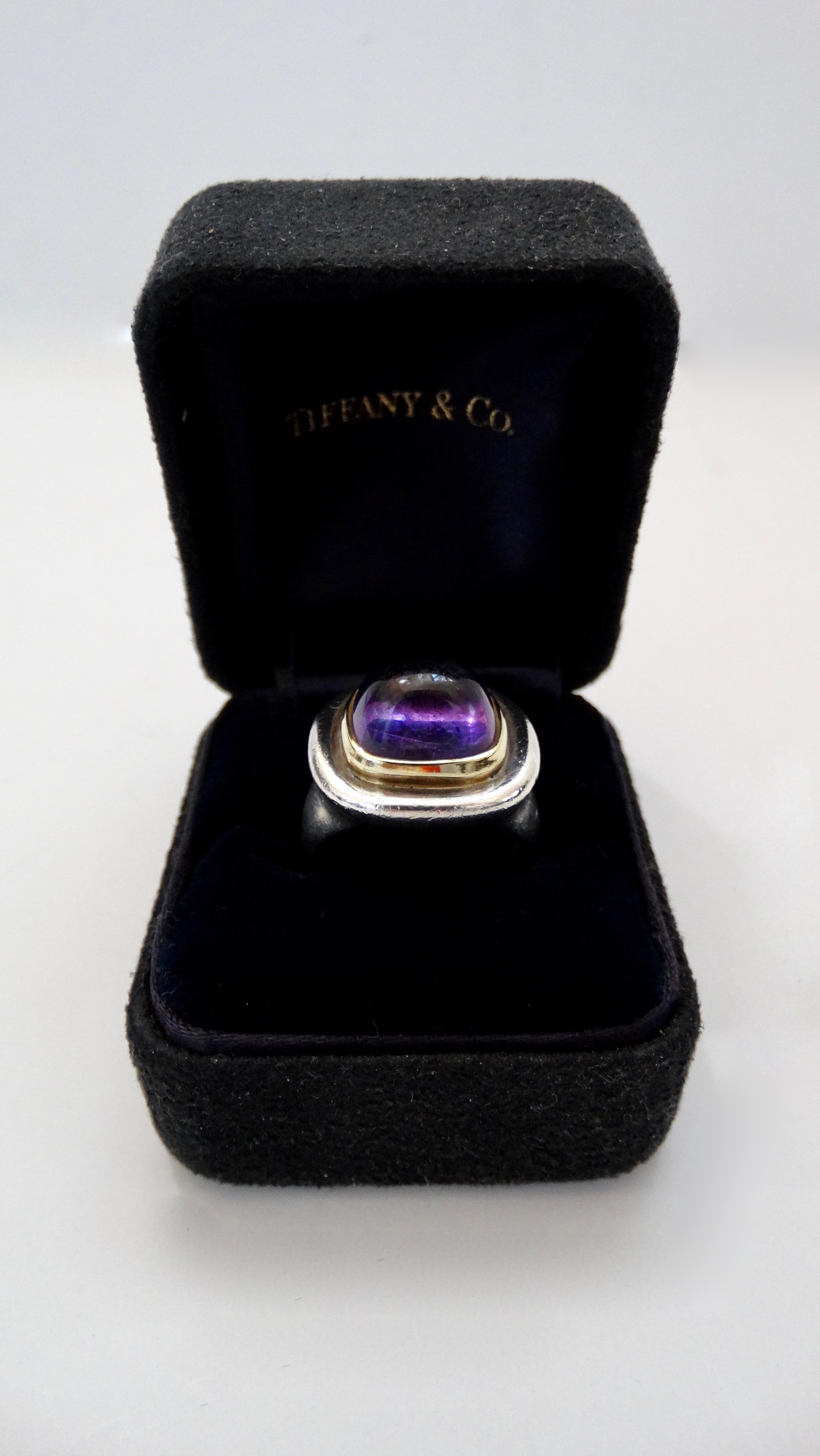 Gorgeous 1980s Paloma Picasso for Tiffany & Co. ring crafted from 18k Gold and Sterling Silver. Features a tiered setting with a cushion cut Amethyst Cabochon as the center stone. Total weight in grams is 11.6 and is a size 7.5.  

Note: 