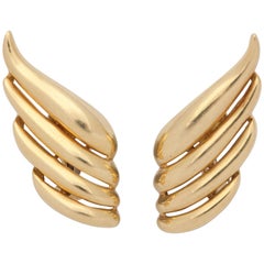 Tiffany 
Co. 1980s Stylish Mercury Wing Design Four-Row Gold Earclips with Post