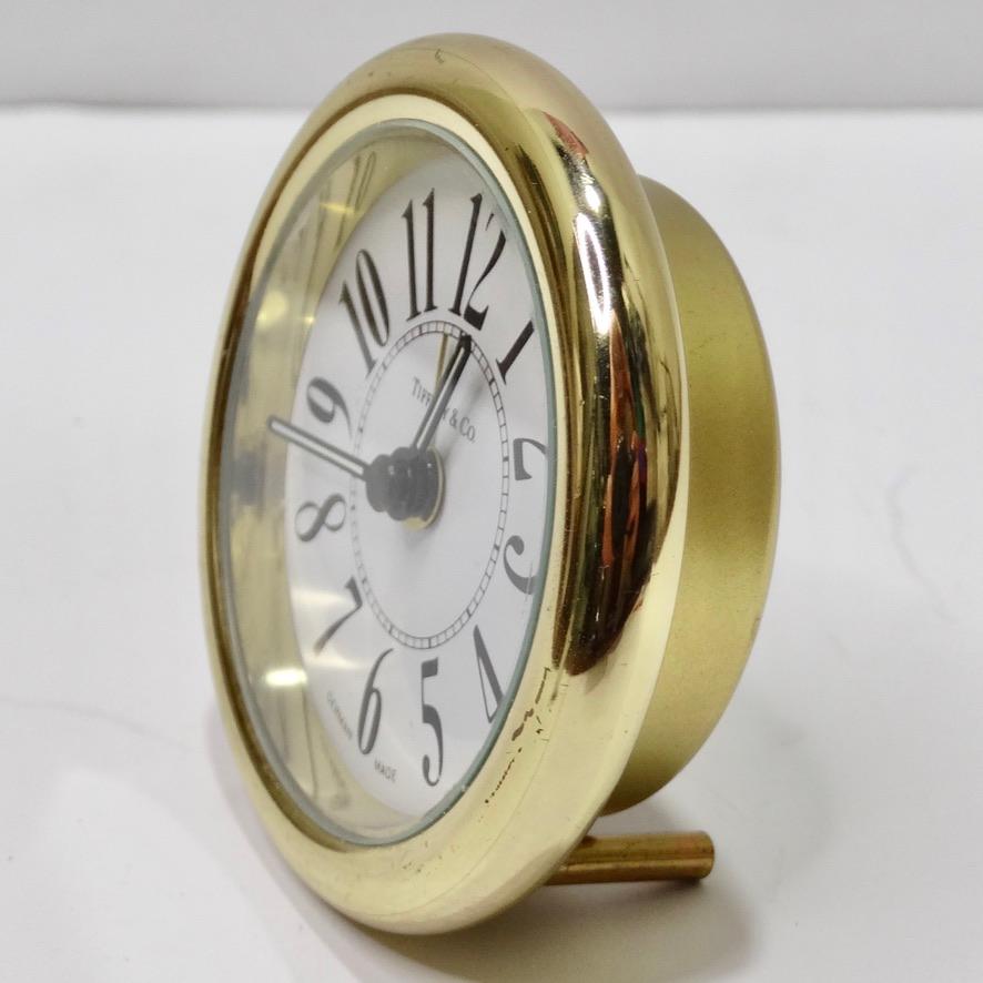 This 1980's Tiffany & Co desk clock is the perfect addition to your office set up! Spice up your office or bed side table with this stunning vintage Tiffany & Co desk clock! A beautiful 24K yellow gold plated clock is completed with a white dial and