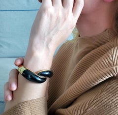 Tiffany & Co. 1981 Elsa Peretti Crossover Black Jade Bangle in 18kt Yellow Gold