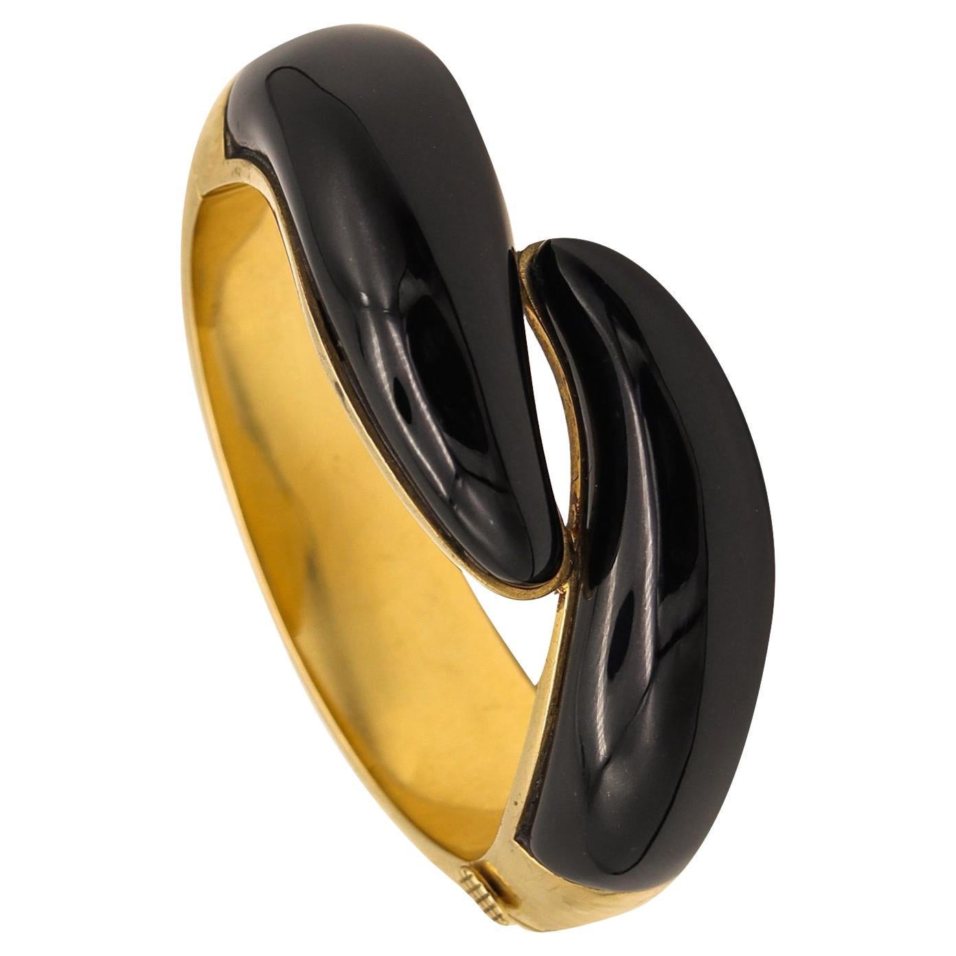 Bracelet jonc croisé Elsa Peretti pour Tiffany & Co. 1981 en or jaune 18 carats en vente