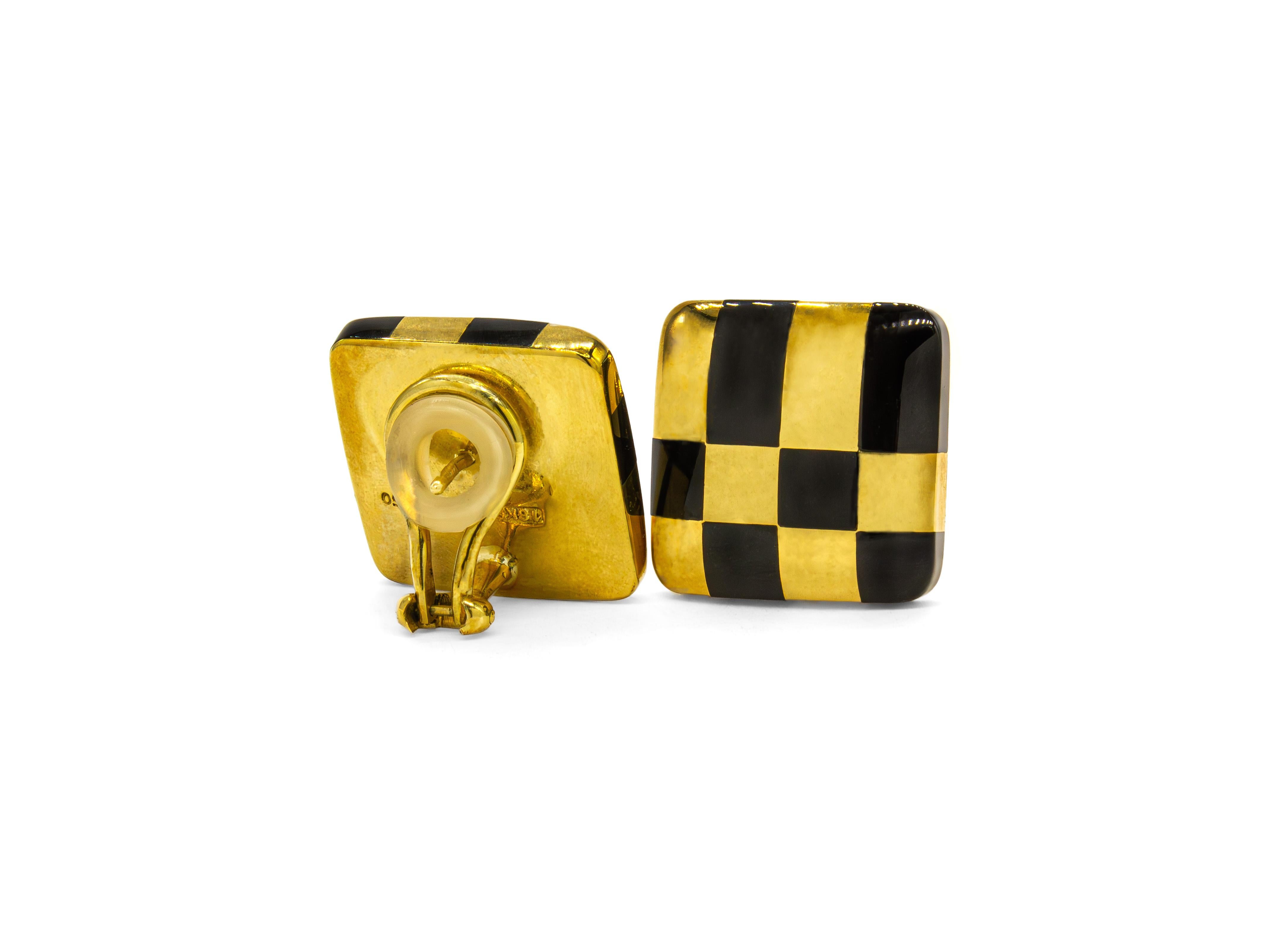 A striking example of 1980s design, these vintage clip-on earrings by Angela Cummings for Tiffany & Co. embody bold geometry and refined craftsmanship. Crafted in solid 18K yellow gold with a high-polish finish, each earring features a checkerboard